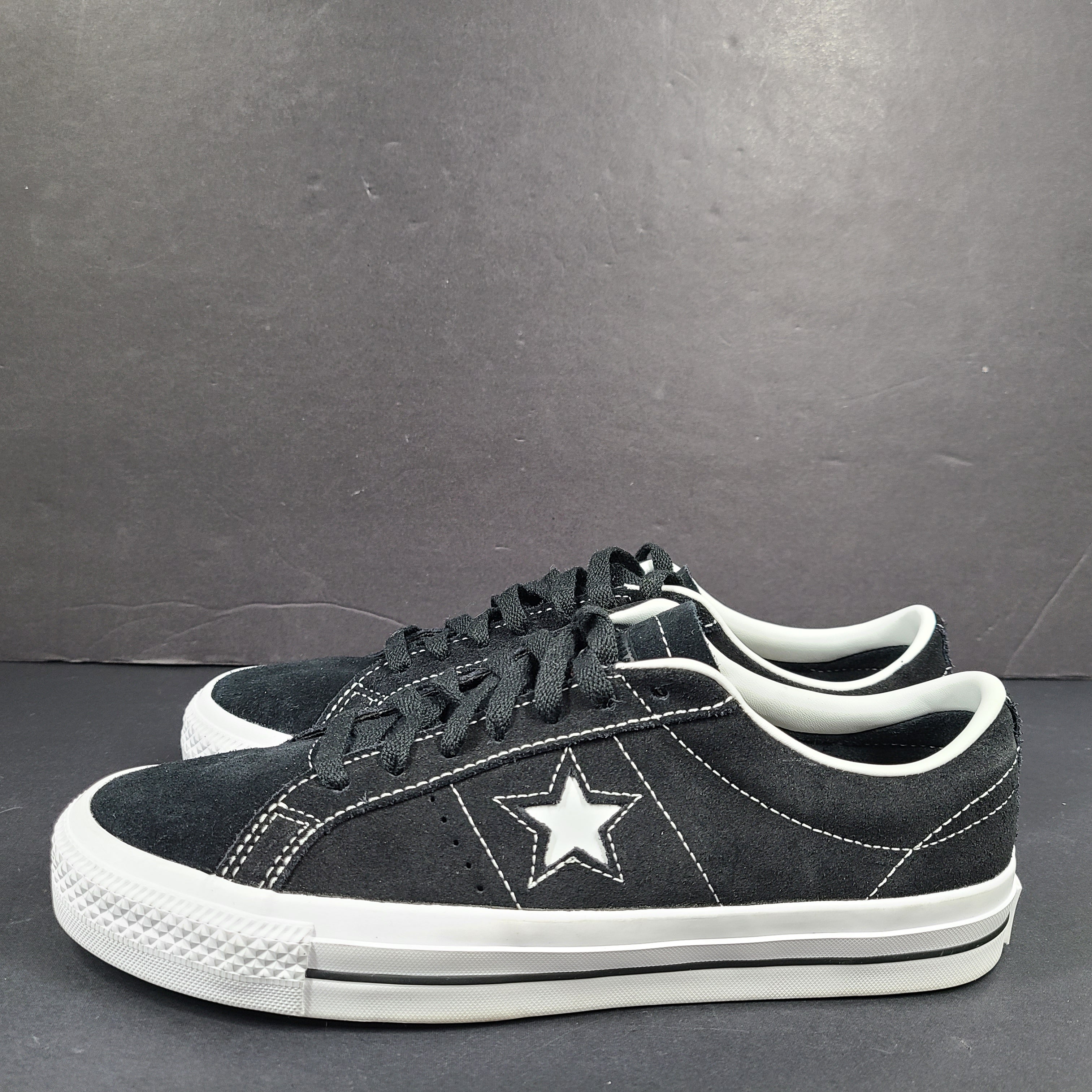 Black and white Converse One Star Pro OX low-top skate shoes in leather with textile lining and a rubber outsole.