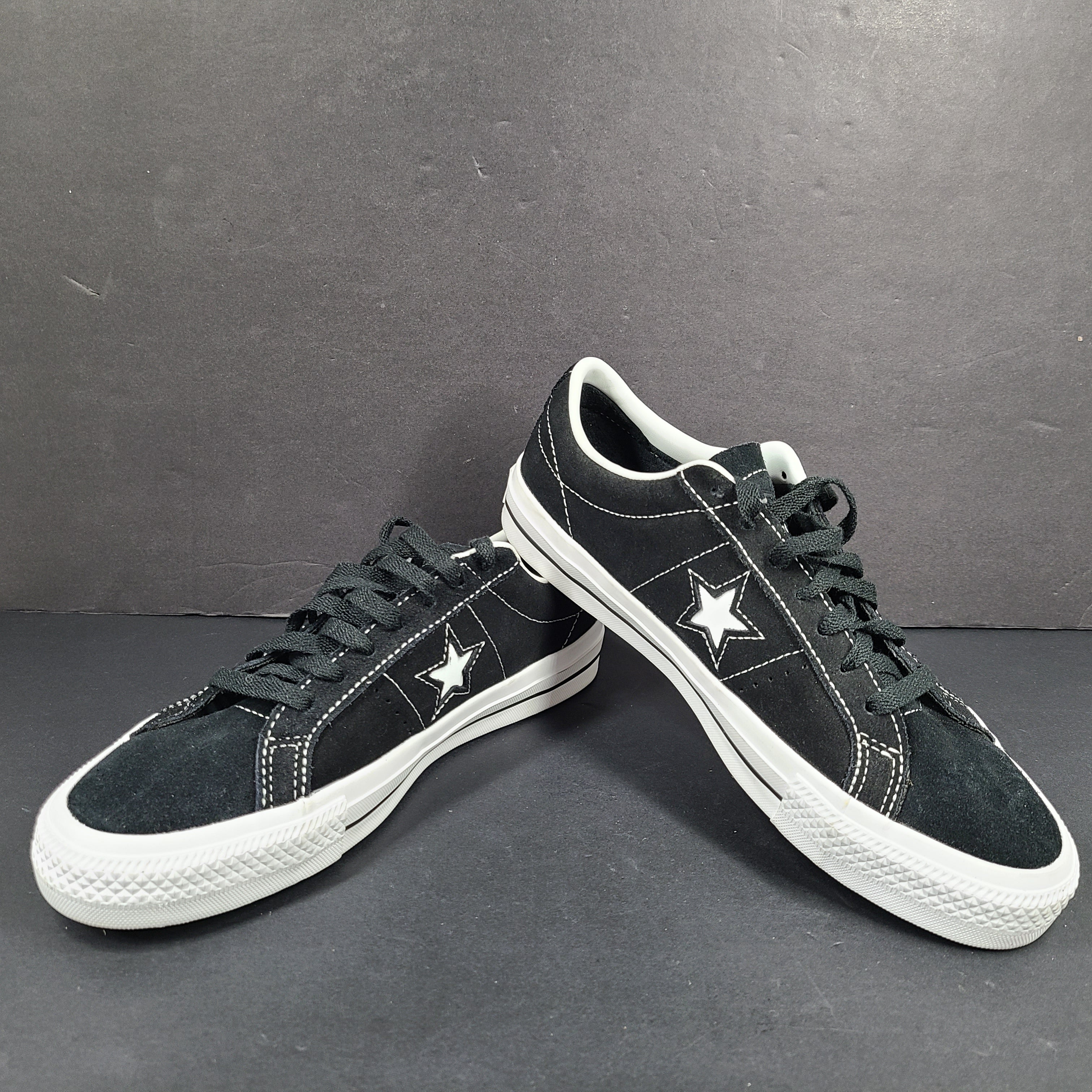 Black and white Converse One Star Pro OX low-top skate shoes in leather with textile lining and a rubber outsole.