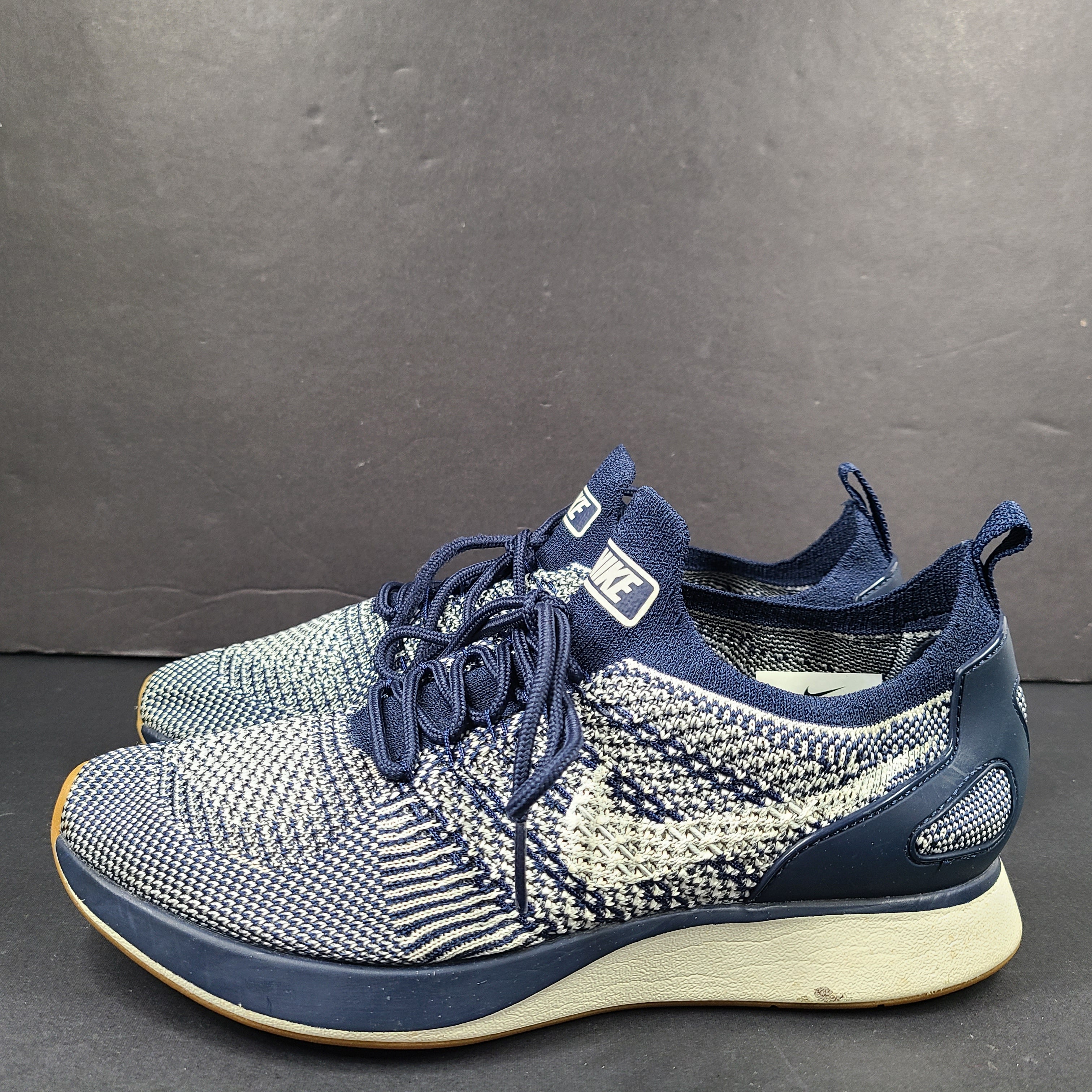 Nike Air Sock Racer Flyknit sneaker in blue and white, US size 8, made in Vietnam.
