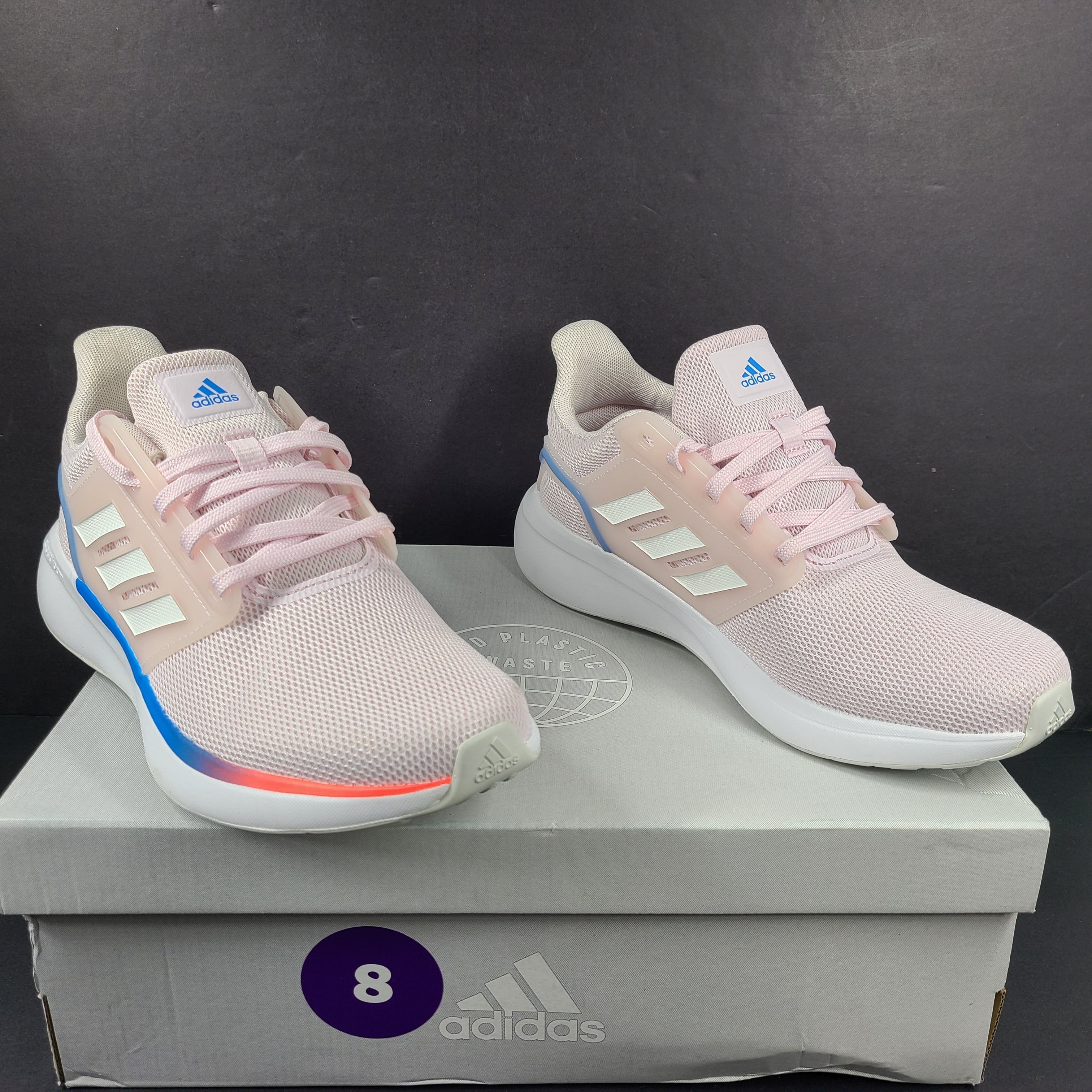 Lightweight pink Adidas running sneakers with Cloudfoam cushioning in US size 8.
