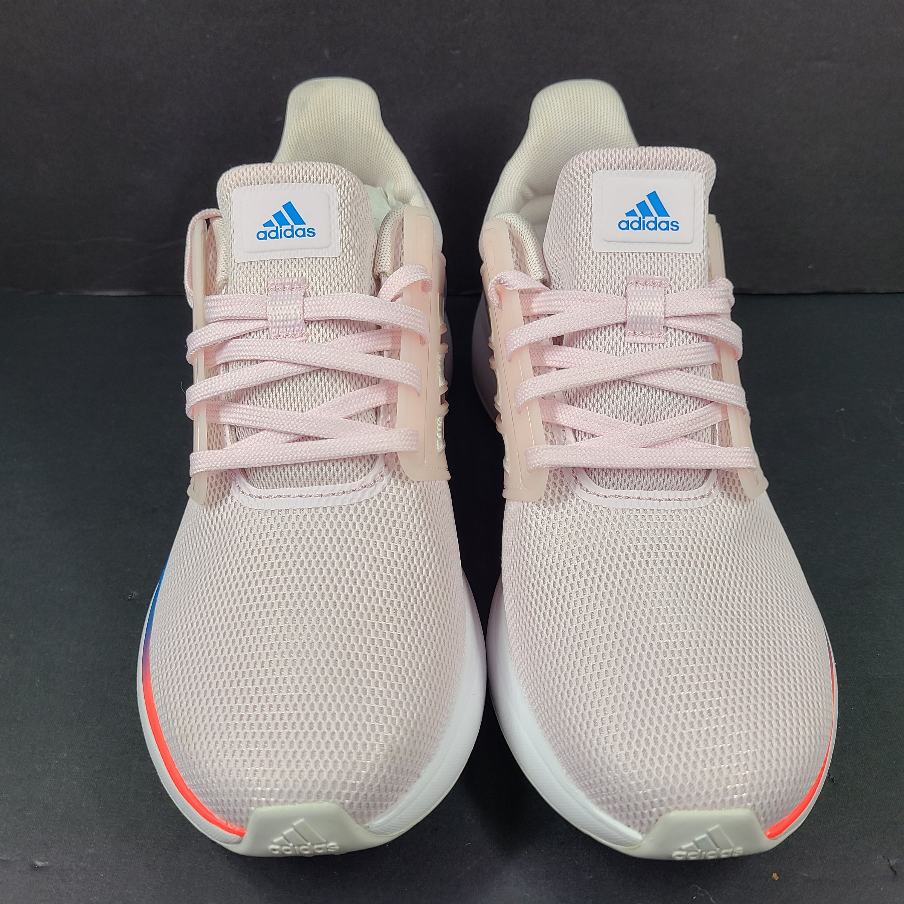 Lightweight pink Adidas running sneakers with Cloudfoam cushioning in US size 8.