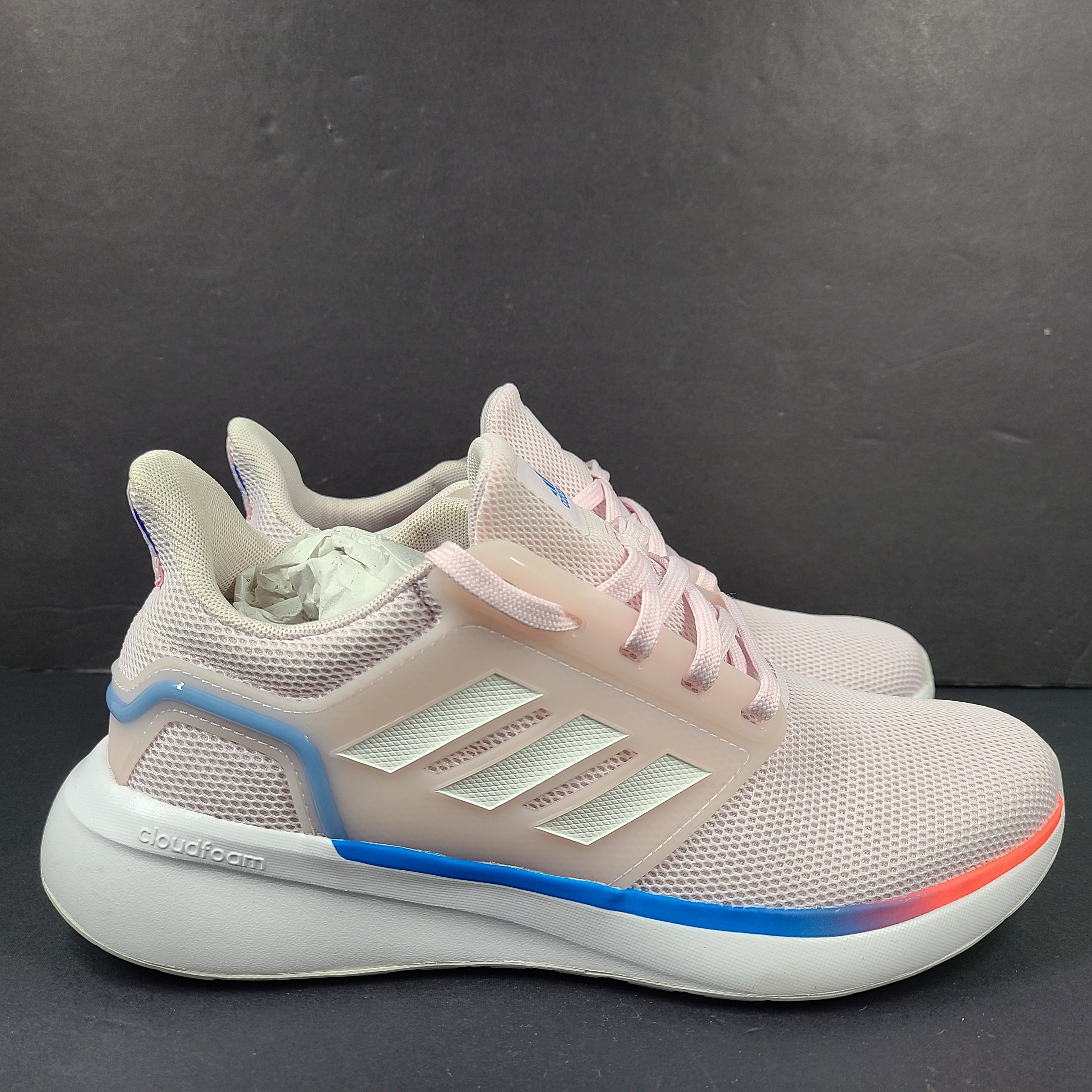 Lightweight pink Adidas running sneakers with Cloudfoam cushioning in US size 8.