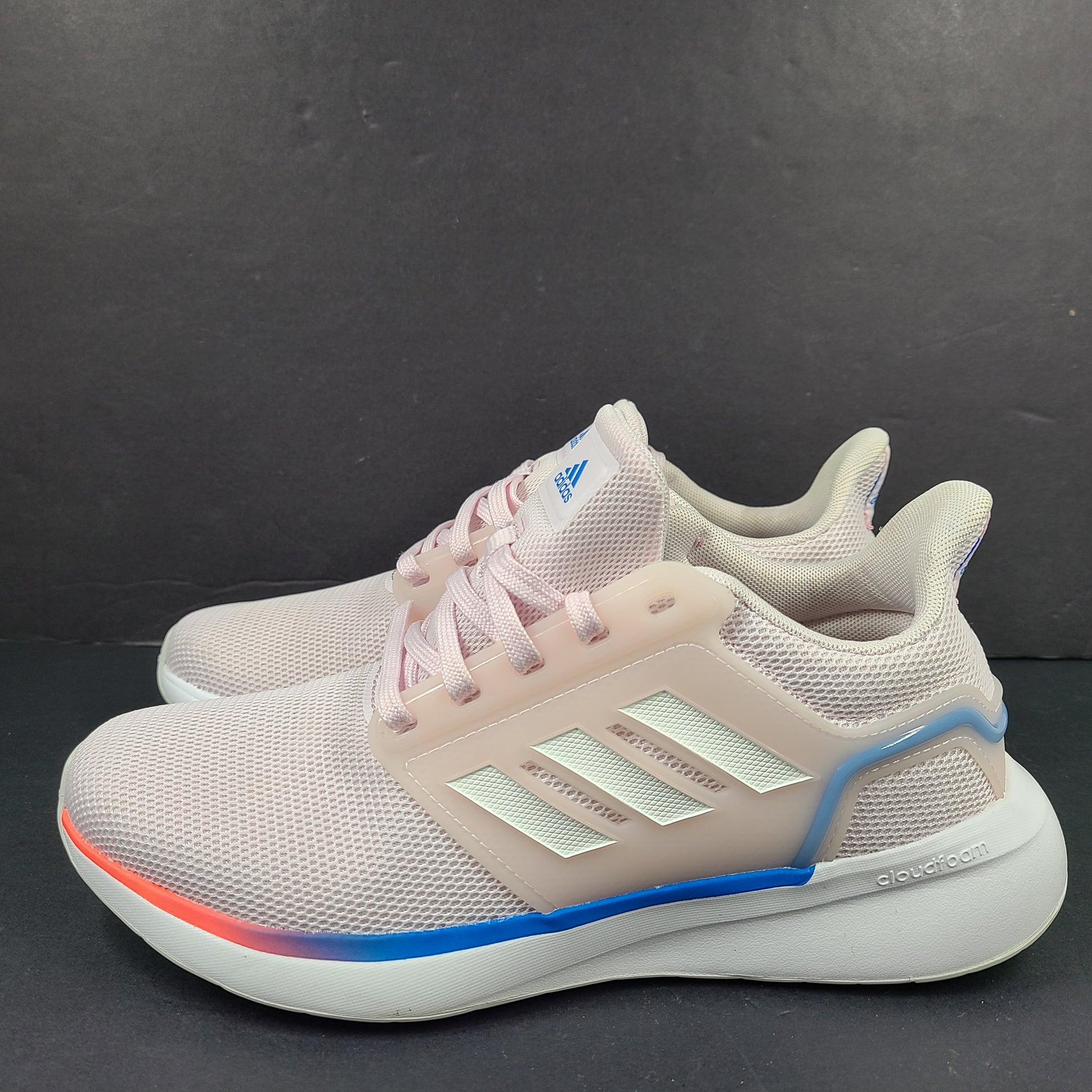Lightweight pink Adidas running sneakers with Cloudfoam cushioning in US size 8.