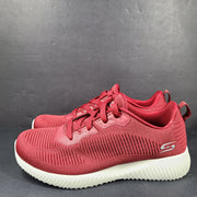 Red Skechers BOBS women's sneaker with cushioned memory foam insole and knit upper for everyday comfort.
