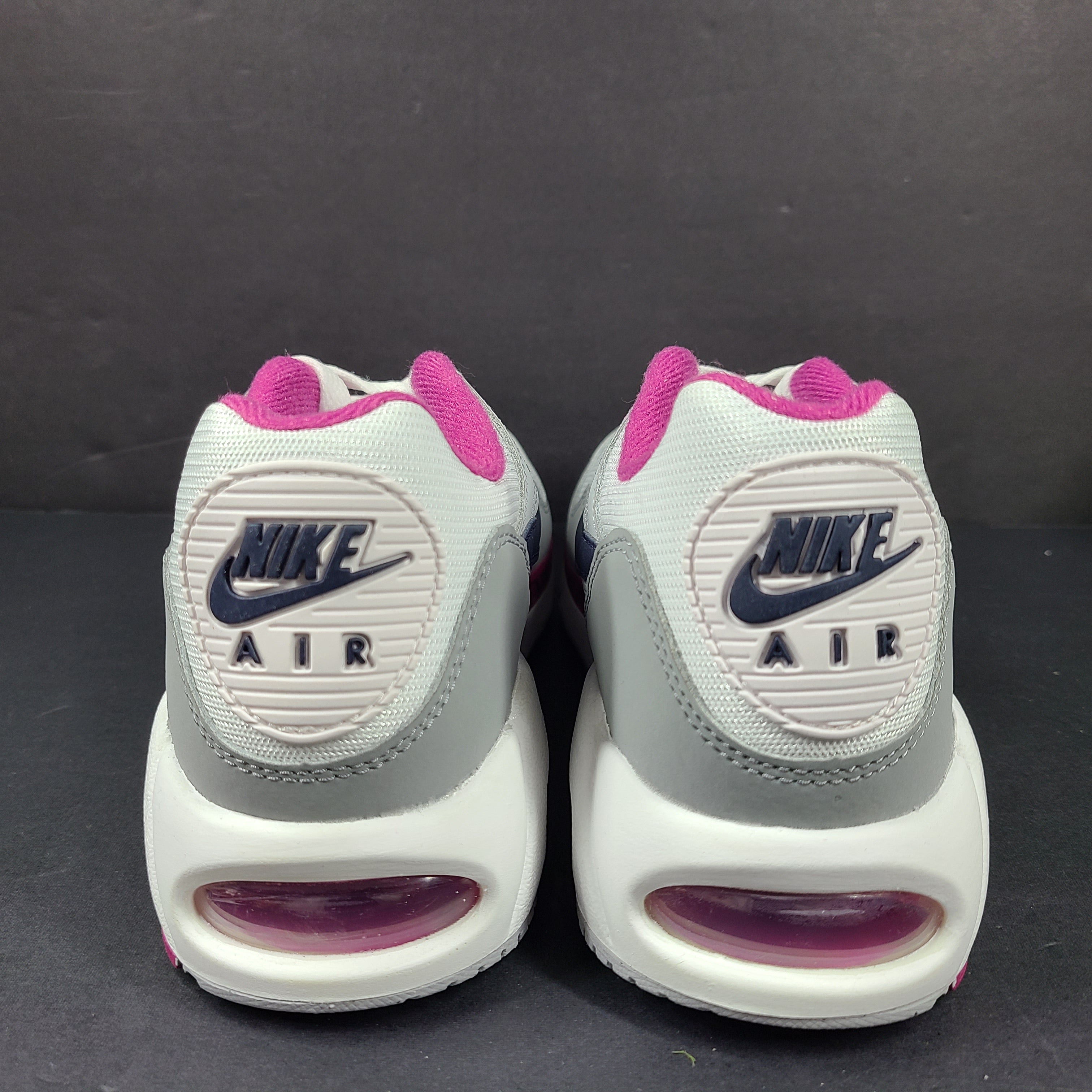 White, grey and pink Nike Air Max Correlate women's sneaker in US size 7.5 with Air Max cushioning.