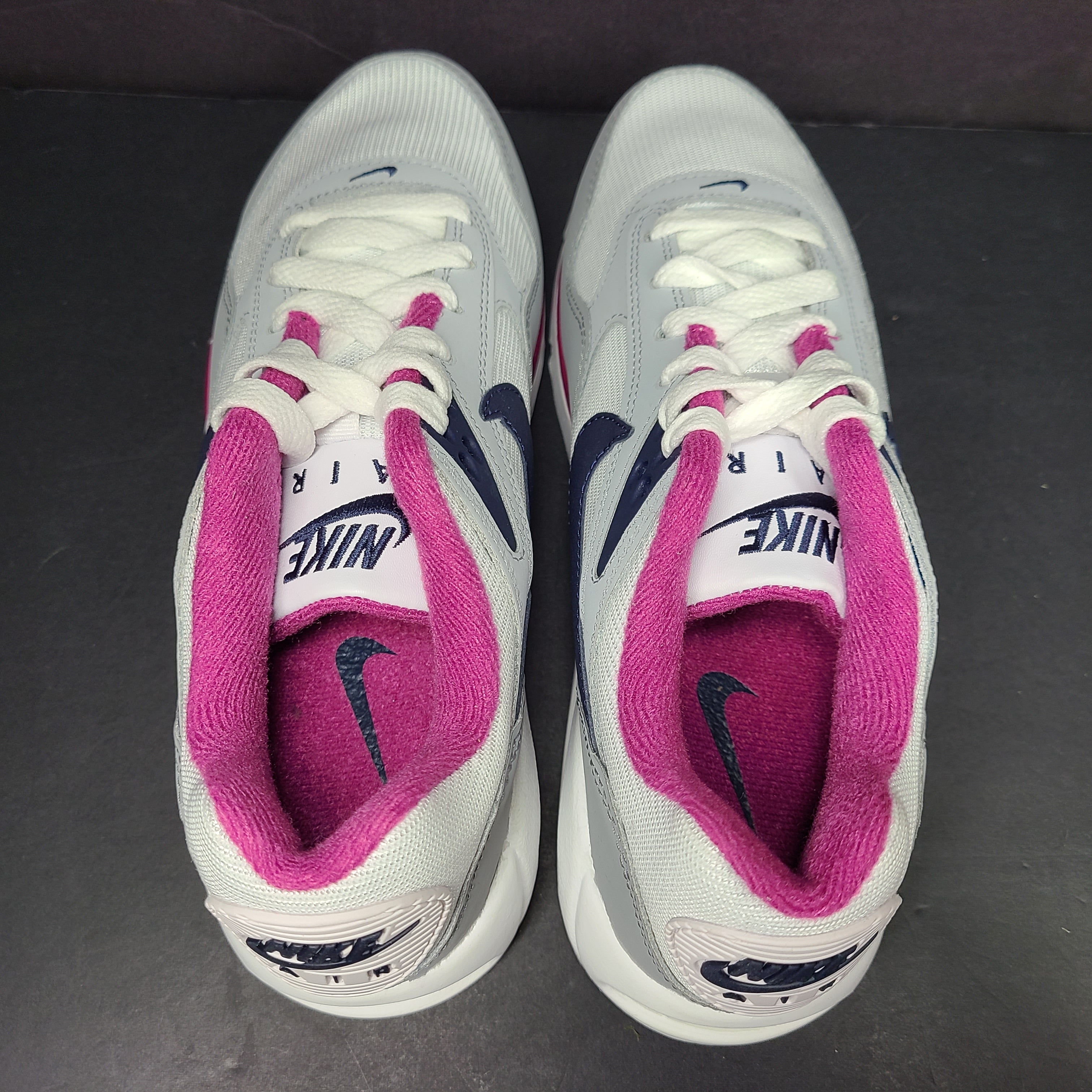 White, grey and pink Nike Air Max Correlate women's sneaker in US size 7.5 with Air Max cushioning.