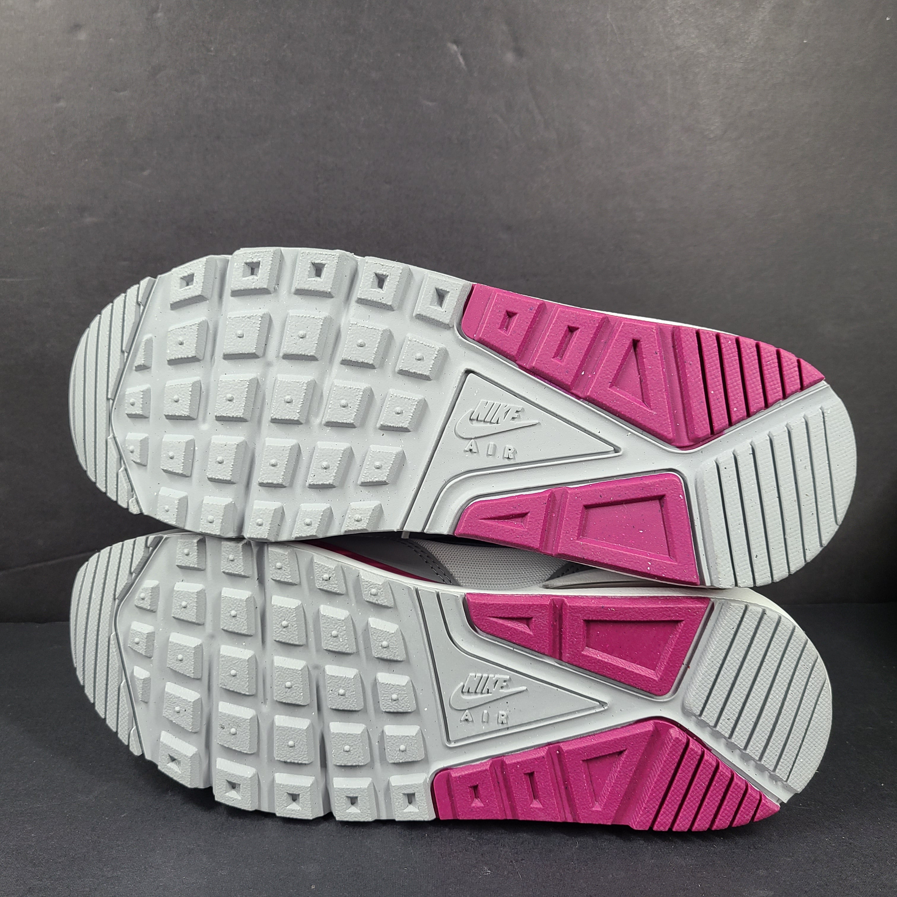 White, grey and pink Nike Air Max Correlate women's sneaker in US size 7.5 with Air Max cushioning.