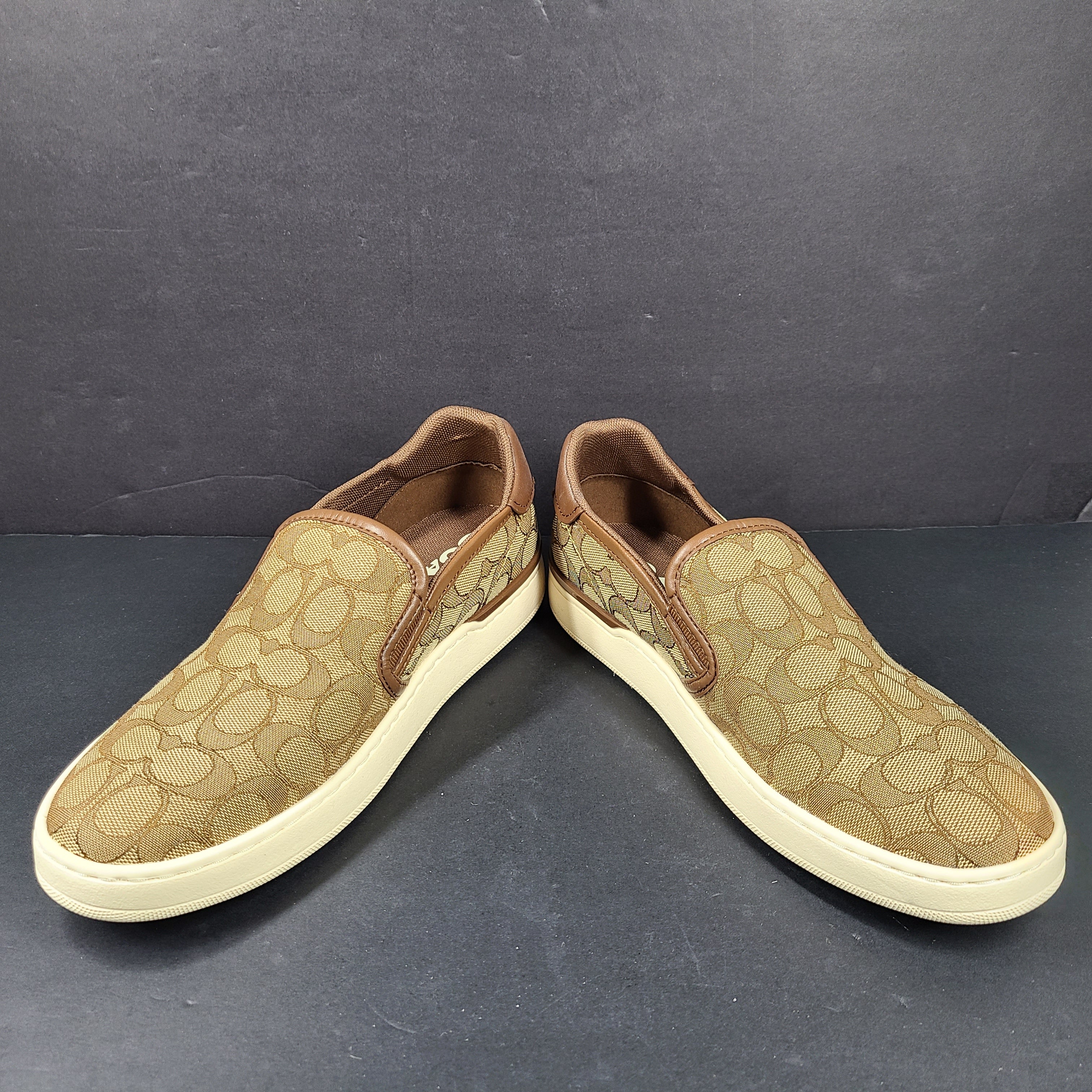 Coach slip-on sneakers model C4393 in brown, size 6.5B, designed for everyday wear.