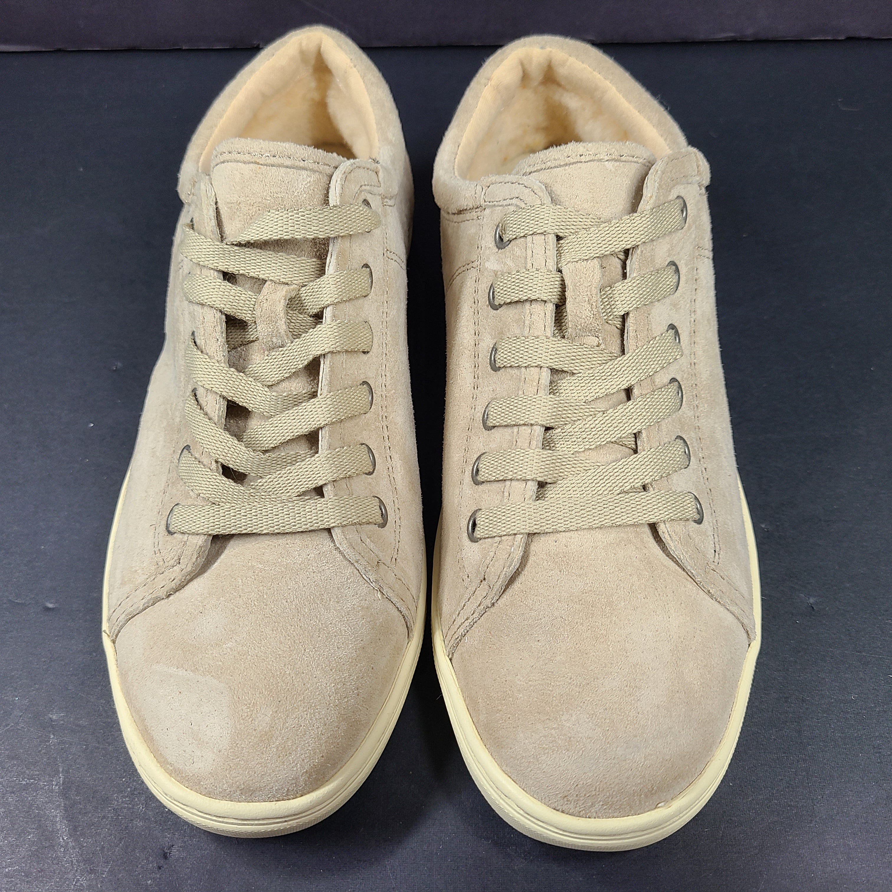 Beige UGG Tomi suede low-top sneakers in US size 7.5 designed for casual comfort.