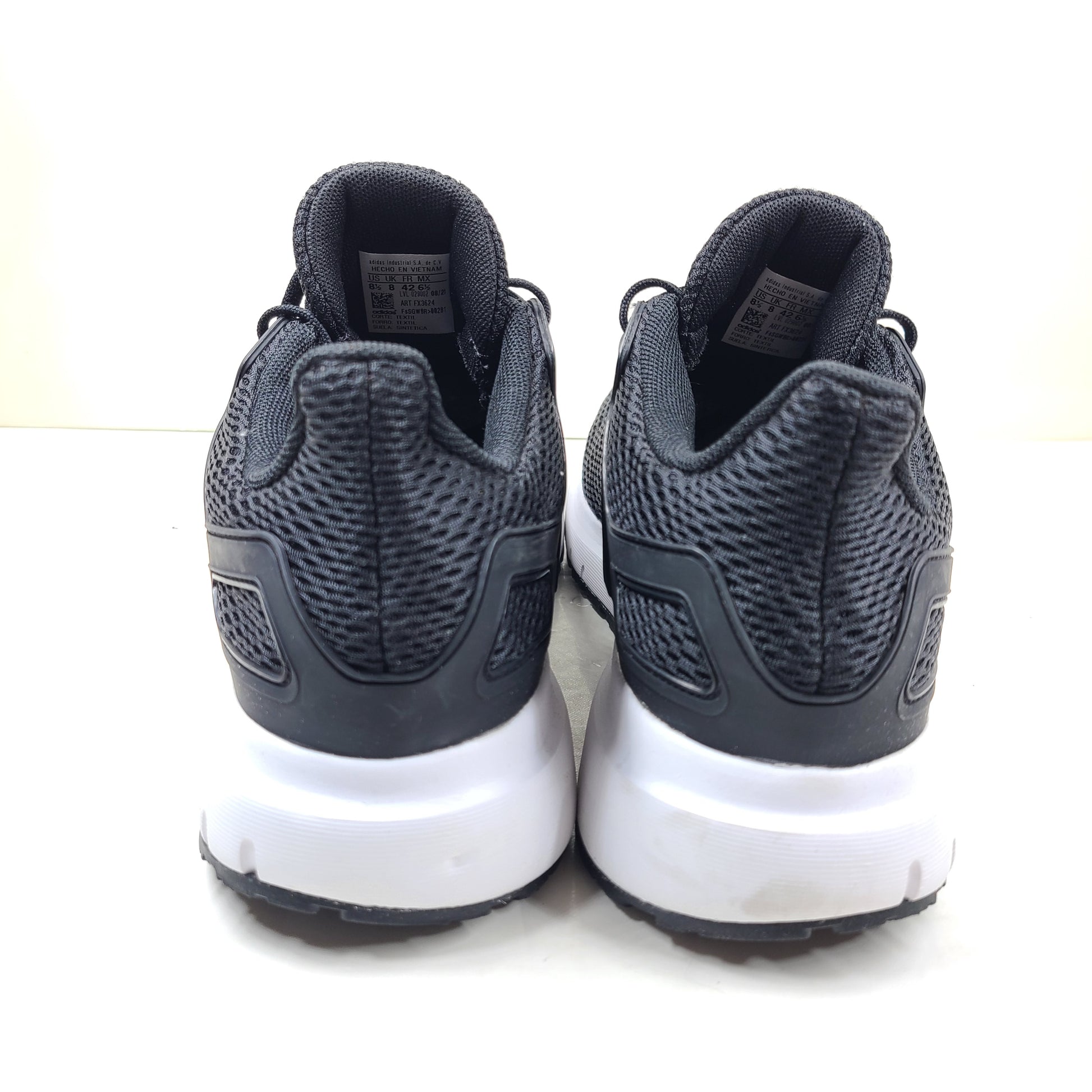 Black Adidas Ultimashow running shoes in US 8.5 with a supportive, low-profile design and durable outsole.