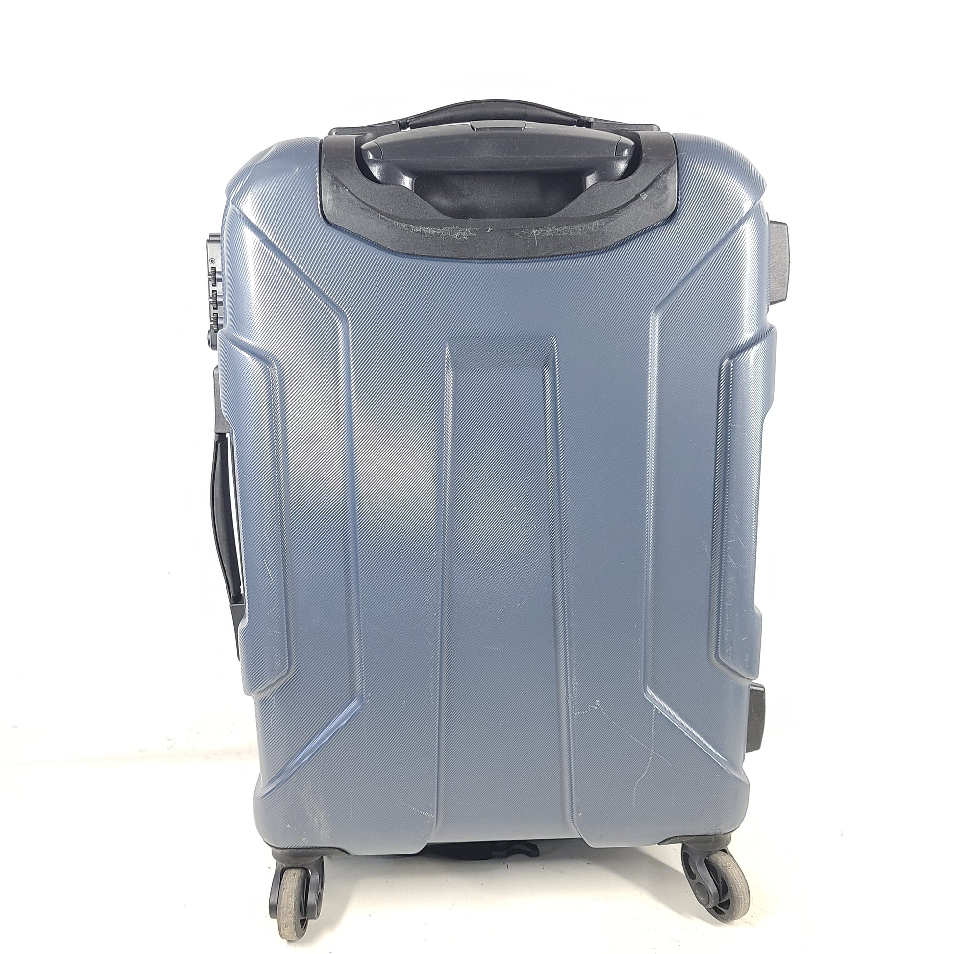 Blue Samsonite 8853 hard-shell spinner suitcase with exterior scuffs and a clean interior.