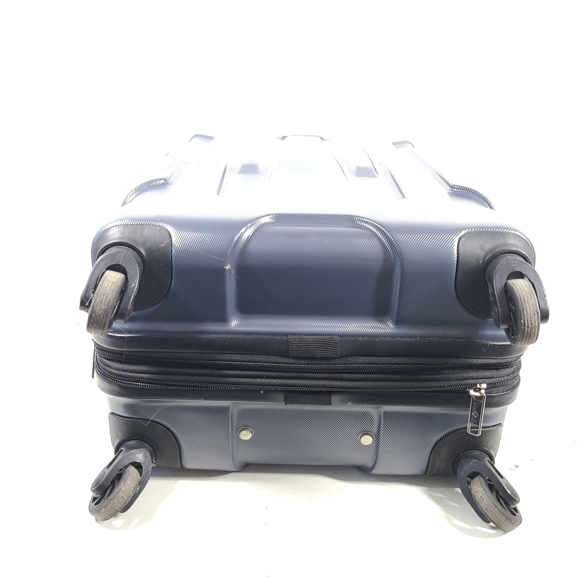 Blue Samsonite 8853 hard-shell spinner suitcase with exterior scuffs and a clean interior.