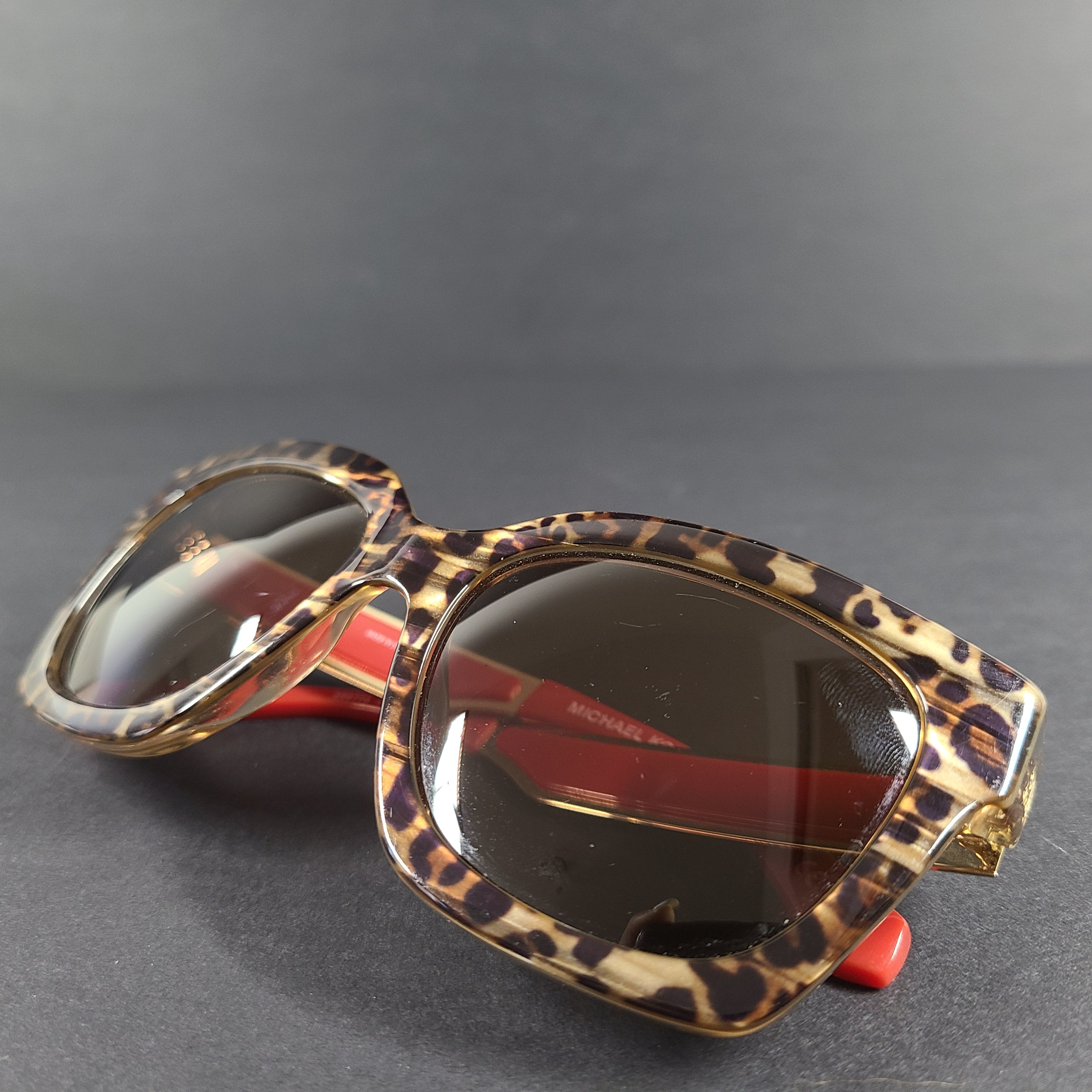 Michael Kors Berkshires MK-2102 leopard and red square sunglasses with logo-accent temples.