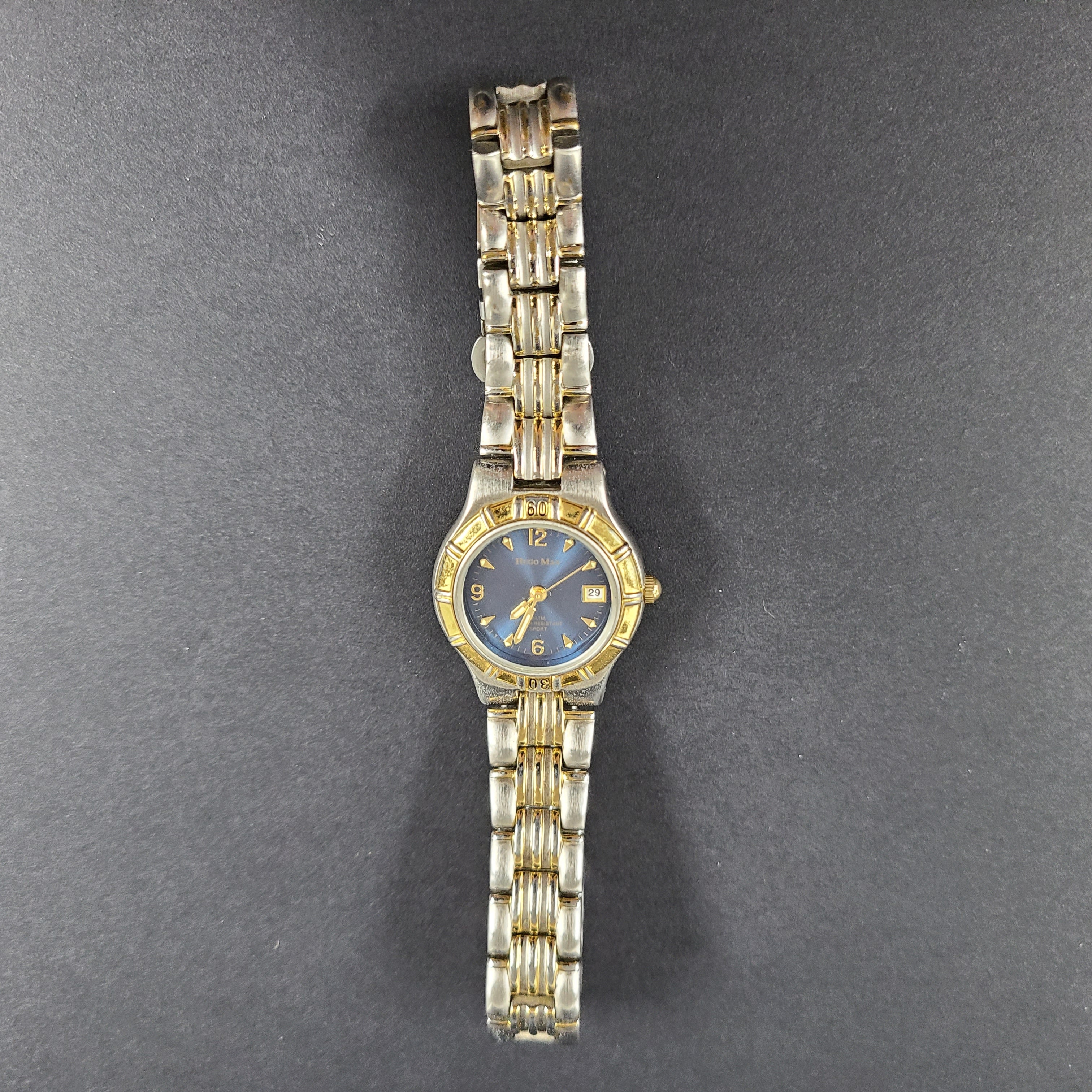 Two-tone Hugo Max wristwatch with 18K gold plating and stainless steel bracelet, model 85047.