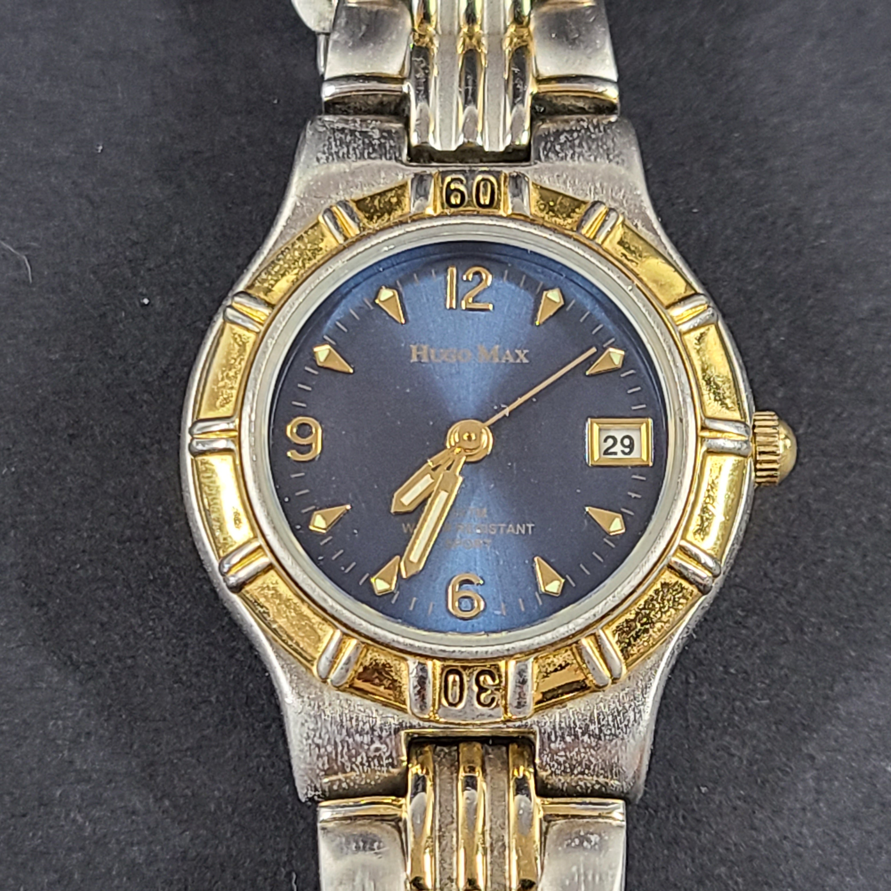 Two-tone Hugo Max wristwatch with 18K gold plating and stainless steel bracelet, model 85047.