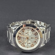 Michael Kors Mercer MK-5725 stainless steel chronograph wristwatch with a silver dial and 42mm case.