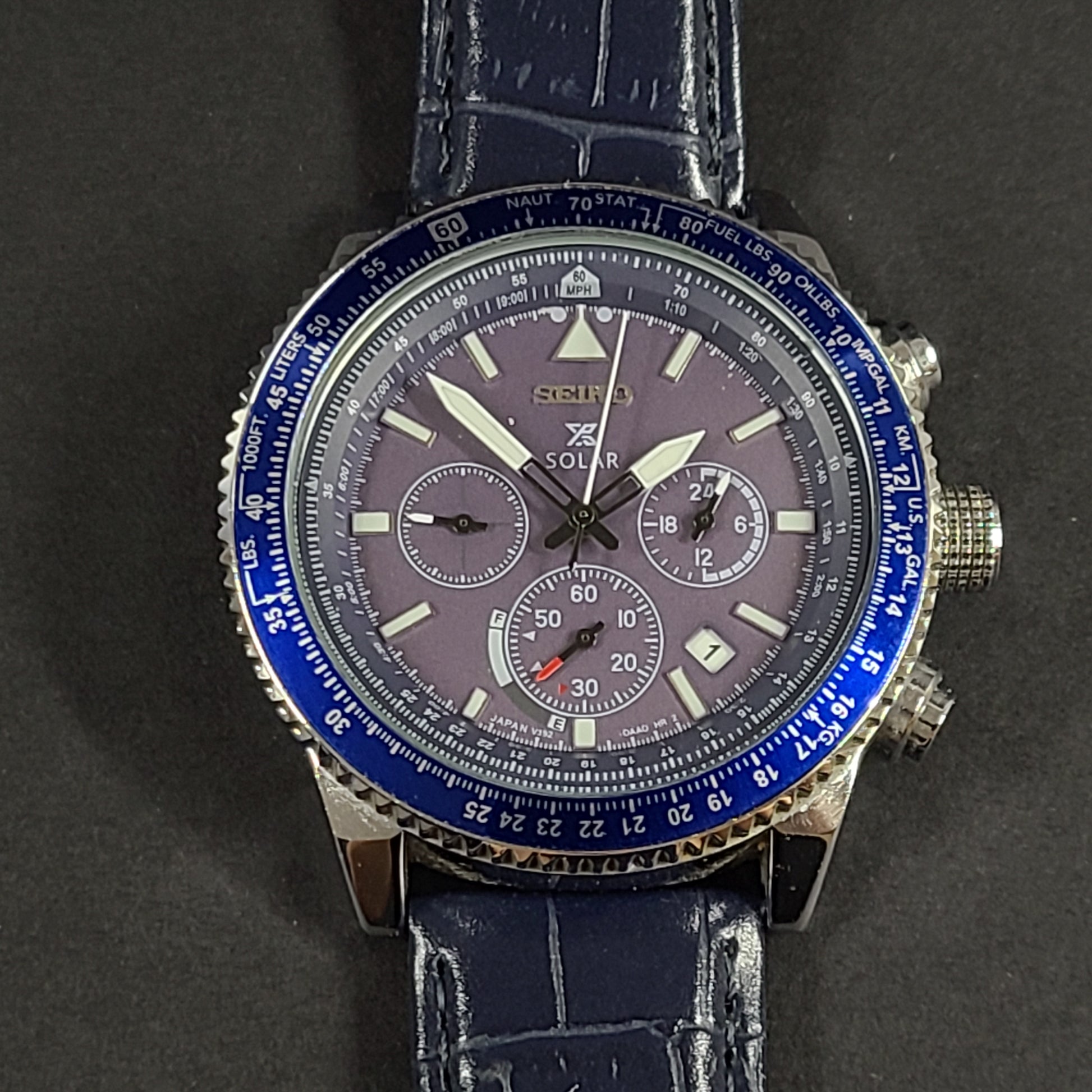 Seiko Prospex solar chronograph with blue dial and stainless steel case and bracelet.