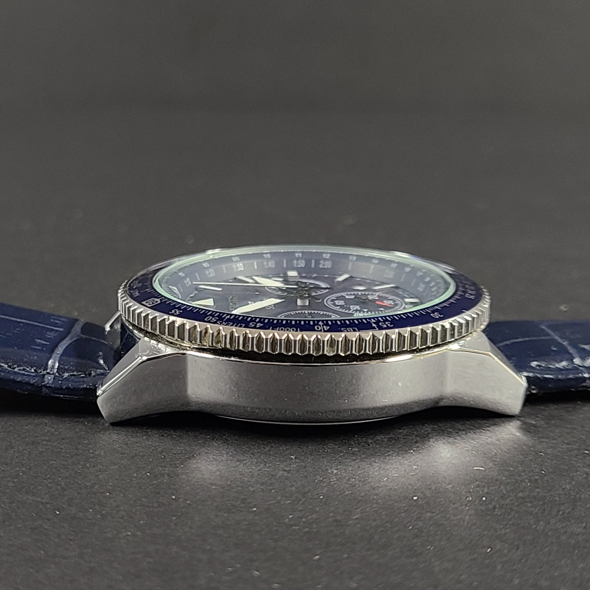 Seiko Prospex solar chronograph with blue dial and stainless steel case and bracelet.