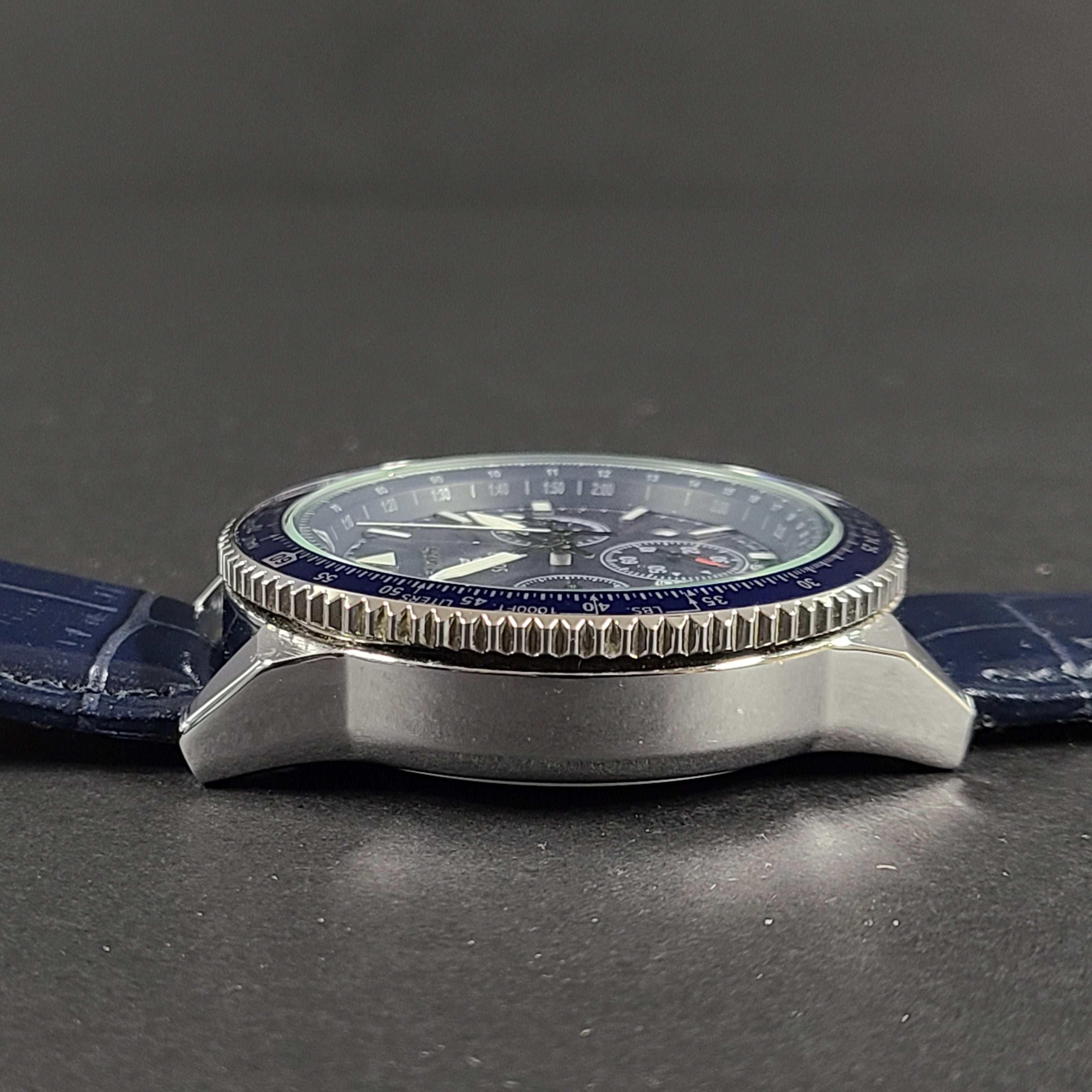 Seiko Prospex solar chronograph with blue dial and stainless steel case and bracelet.
