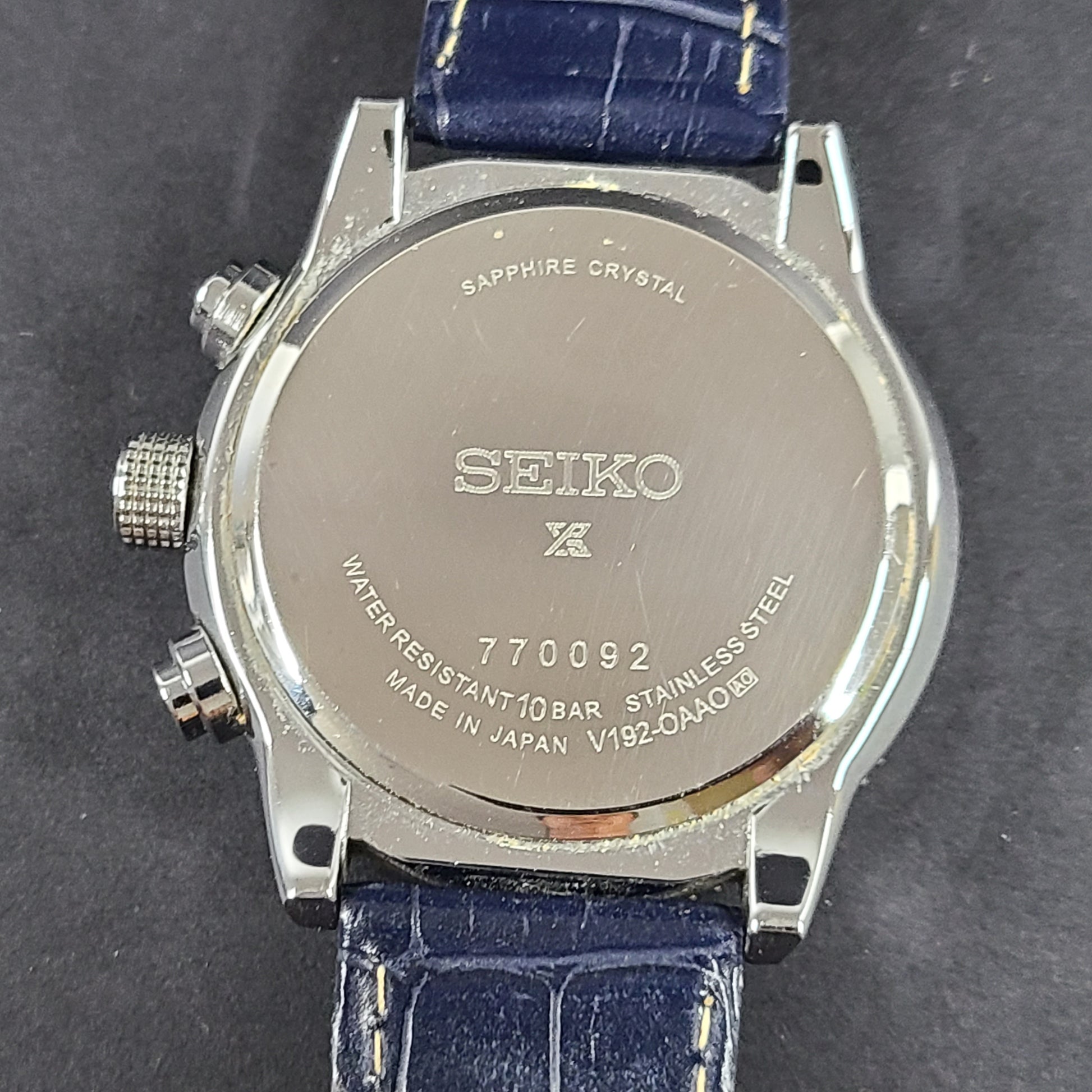 Seiko Prospex solar chronograph with blue dial and stainless steel case and bracelet.