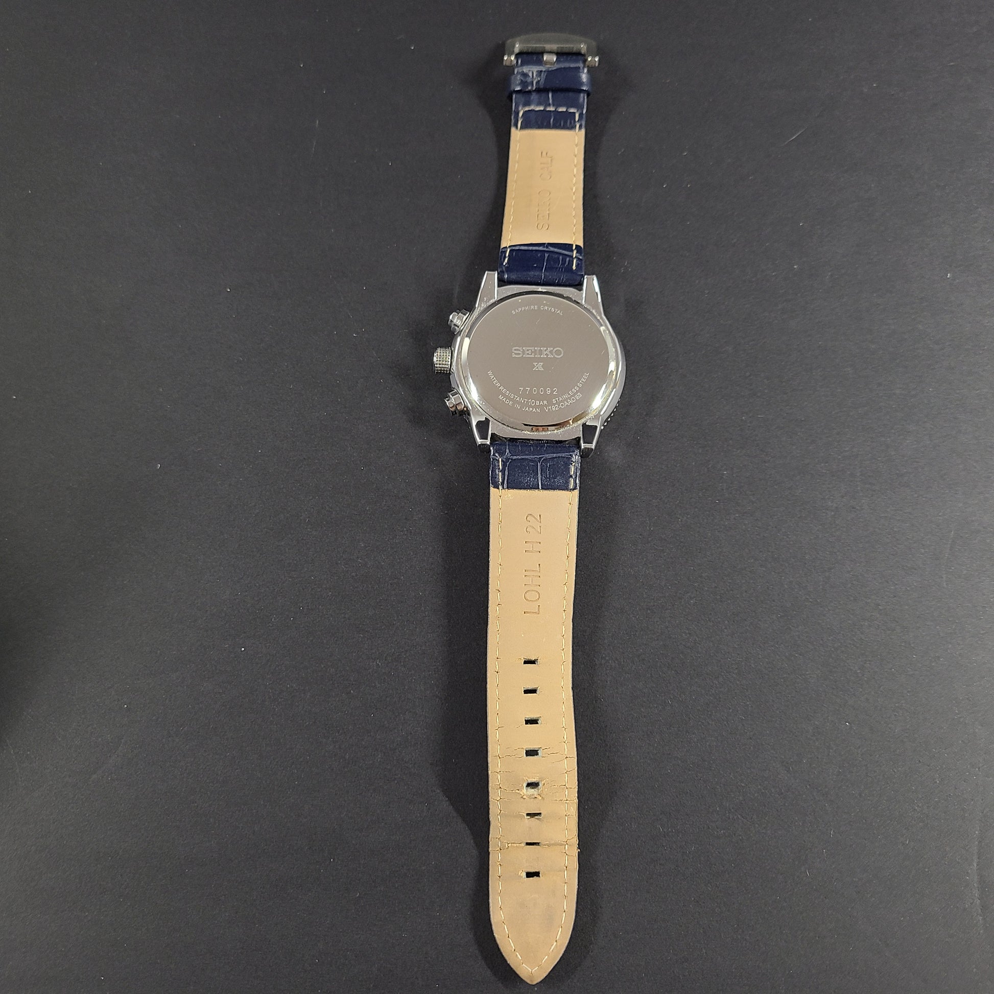 Seiko Prospex solar chronograph with blue dial and stainless steel case and bracelet.