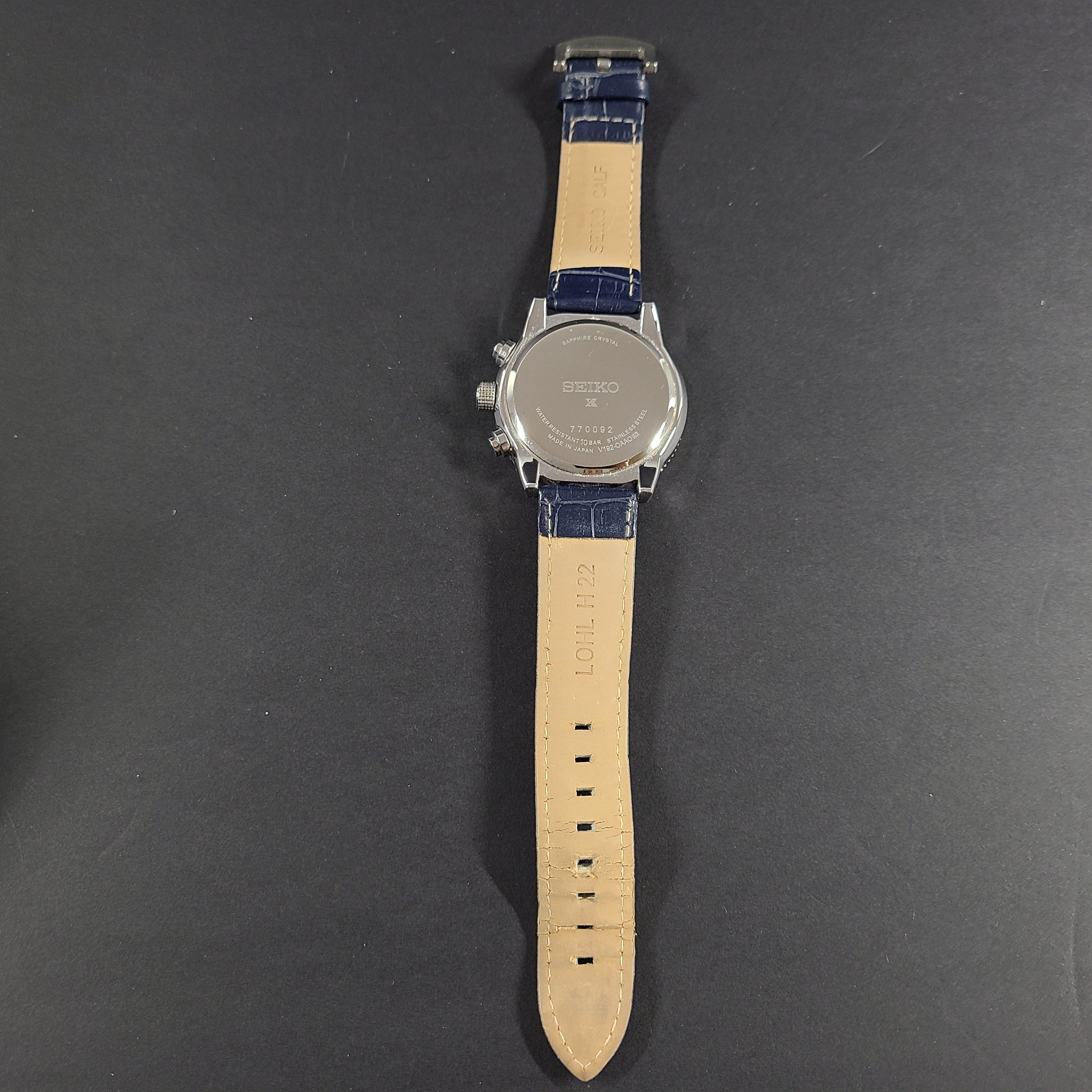 Seiko Prospex solar chronograph with blue dial and stainless steel case and bracelet.