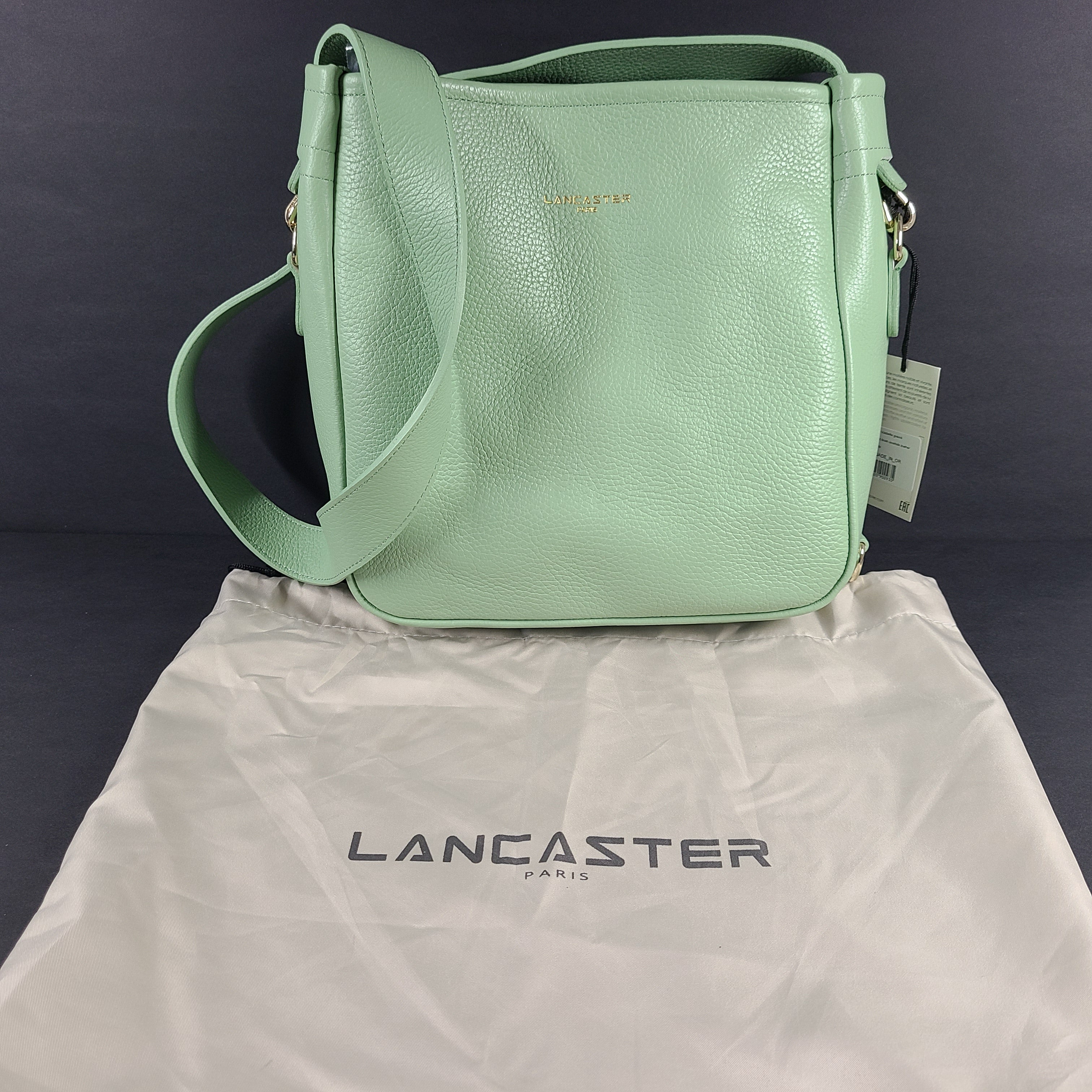 Lancaster Paris grained leather handbag in jade with Vachette interior and French construction.