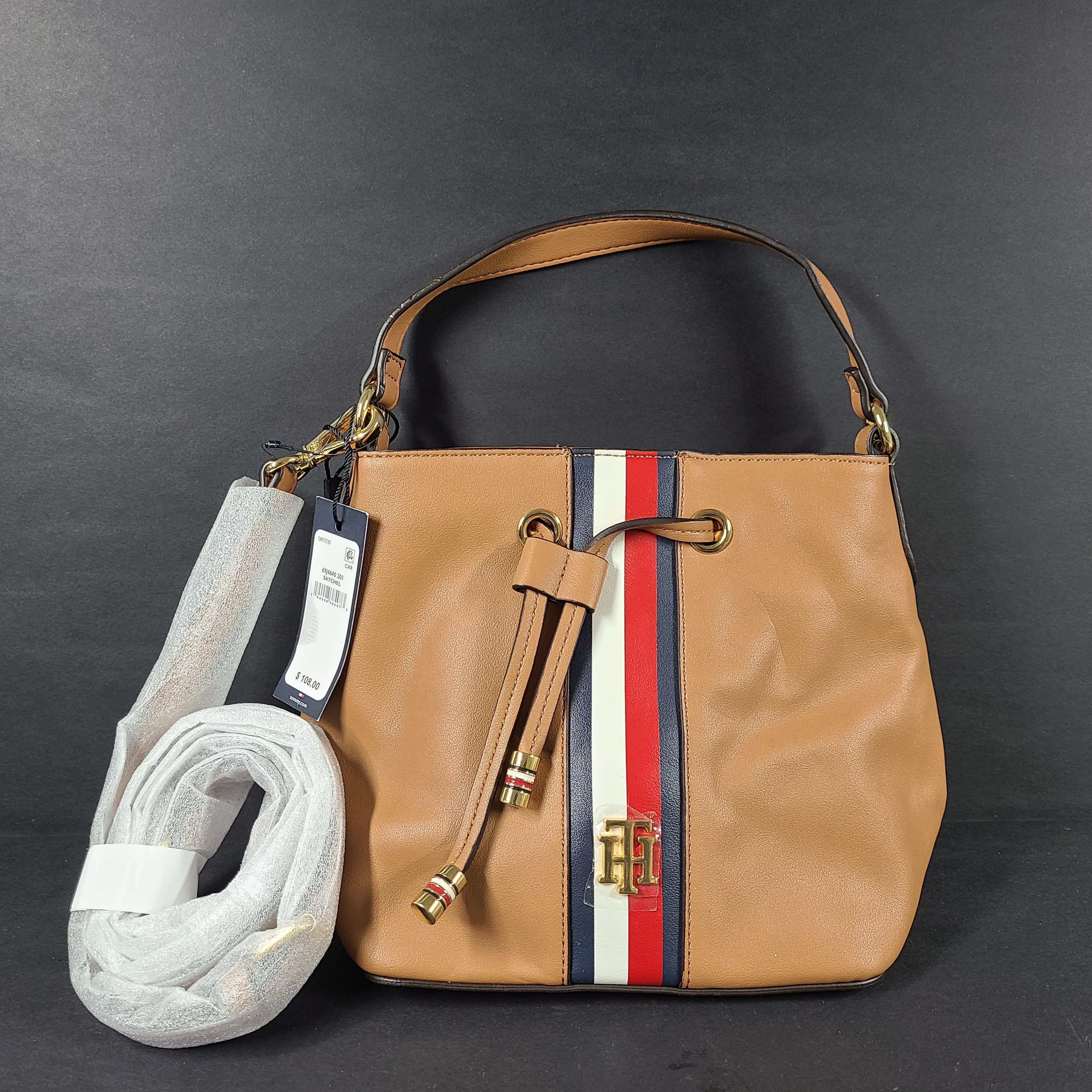 Tommy Hilfiger tan satchel with multicolor accents and signature branding for everyday use.