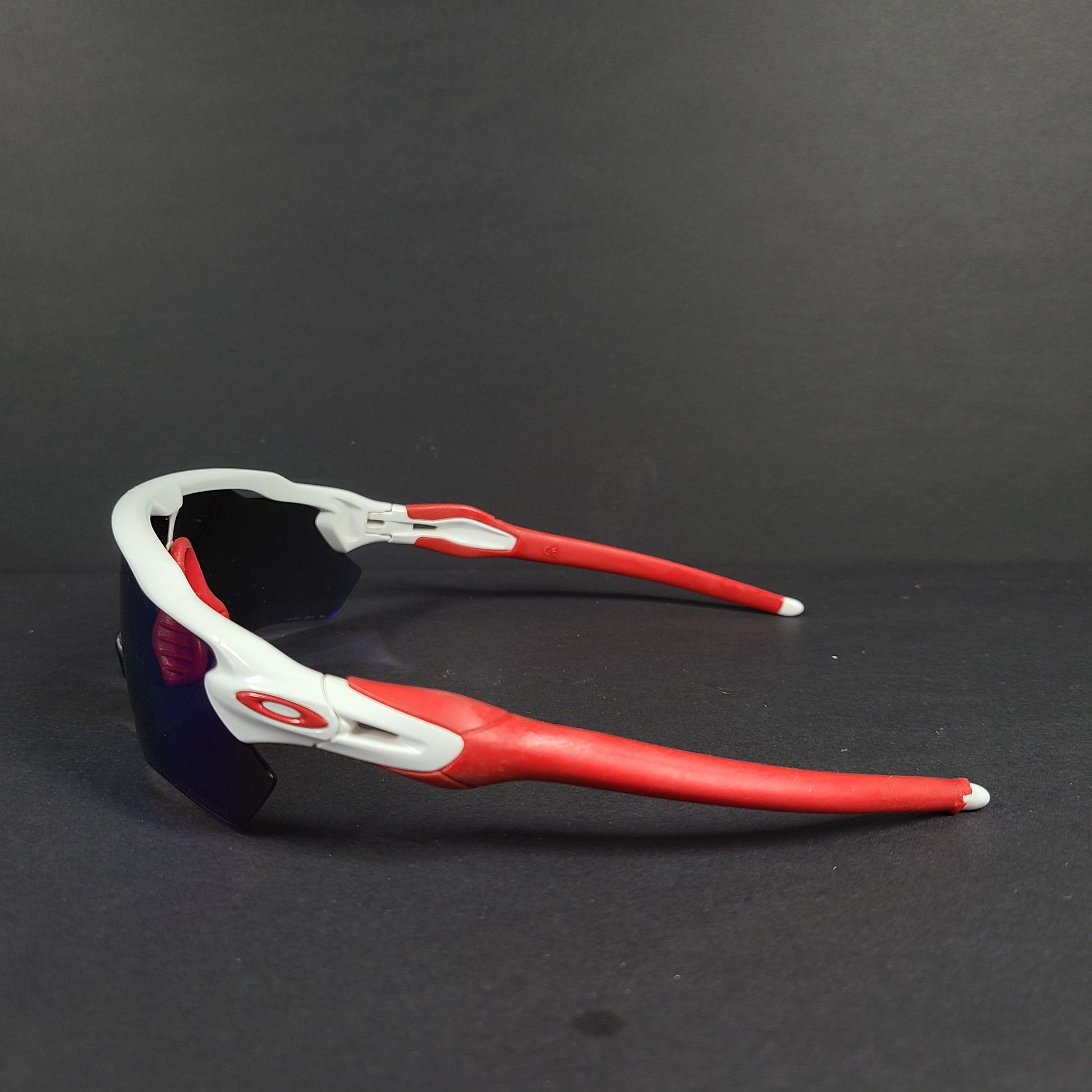 Oakley Radar EV Path lens kit with red, white and blue accents and an extra replacement lens, packaged with an original case.