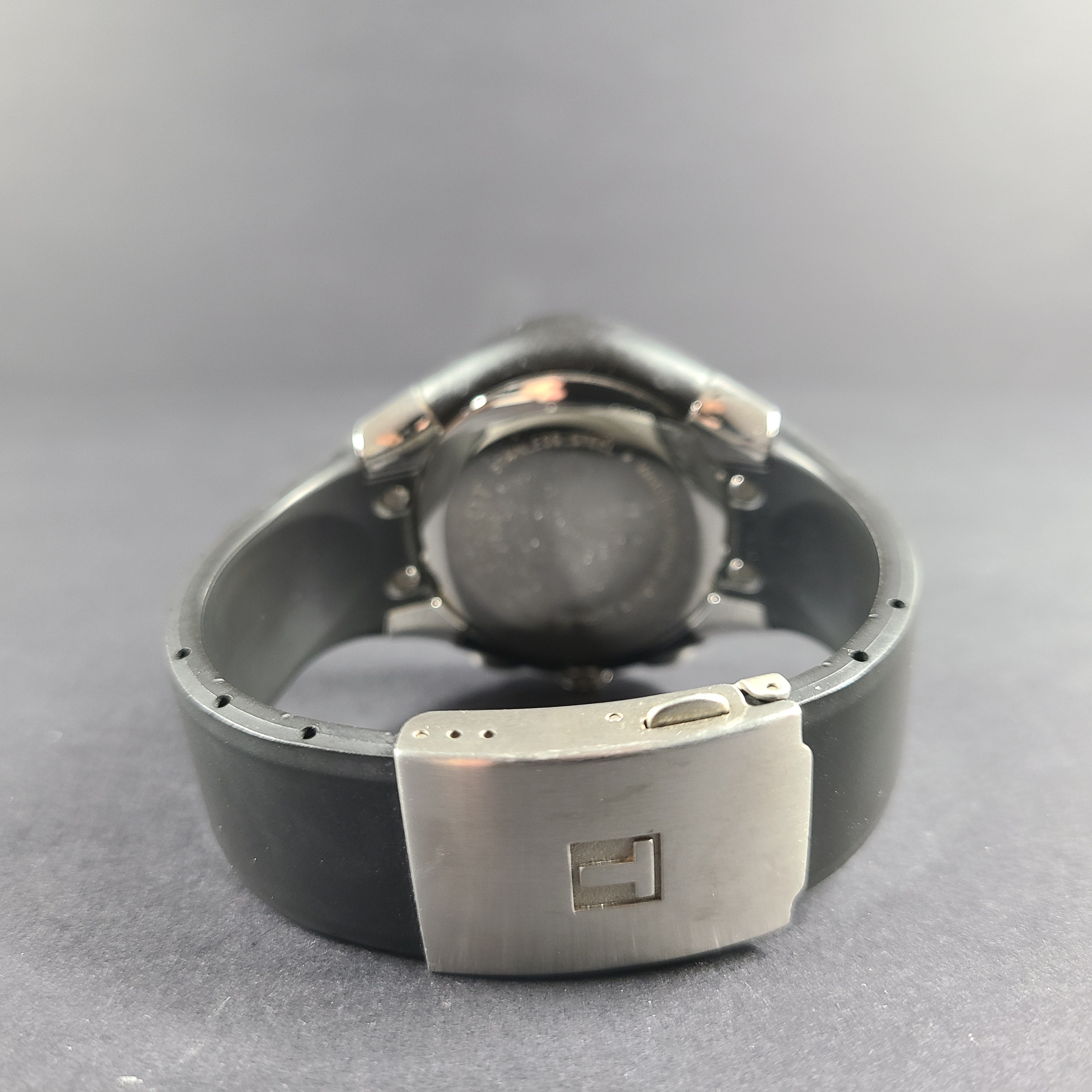 Tissot T Navigator 3000 stainless steel wristwatch with black dial and metal bracelet.
