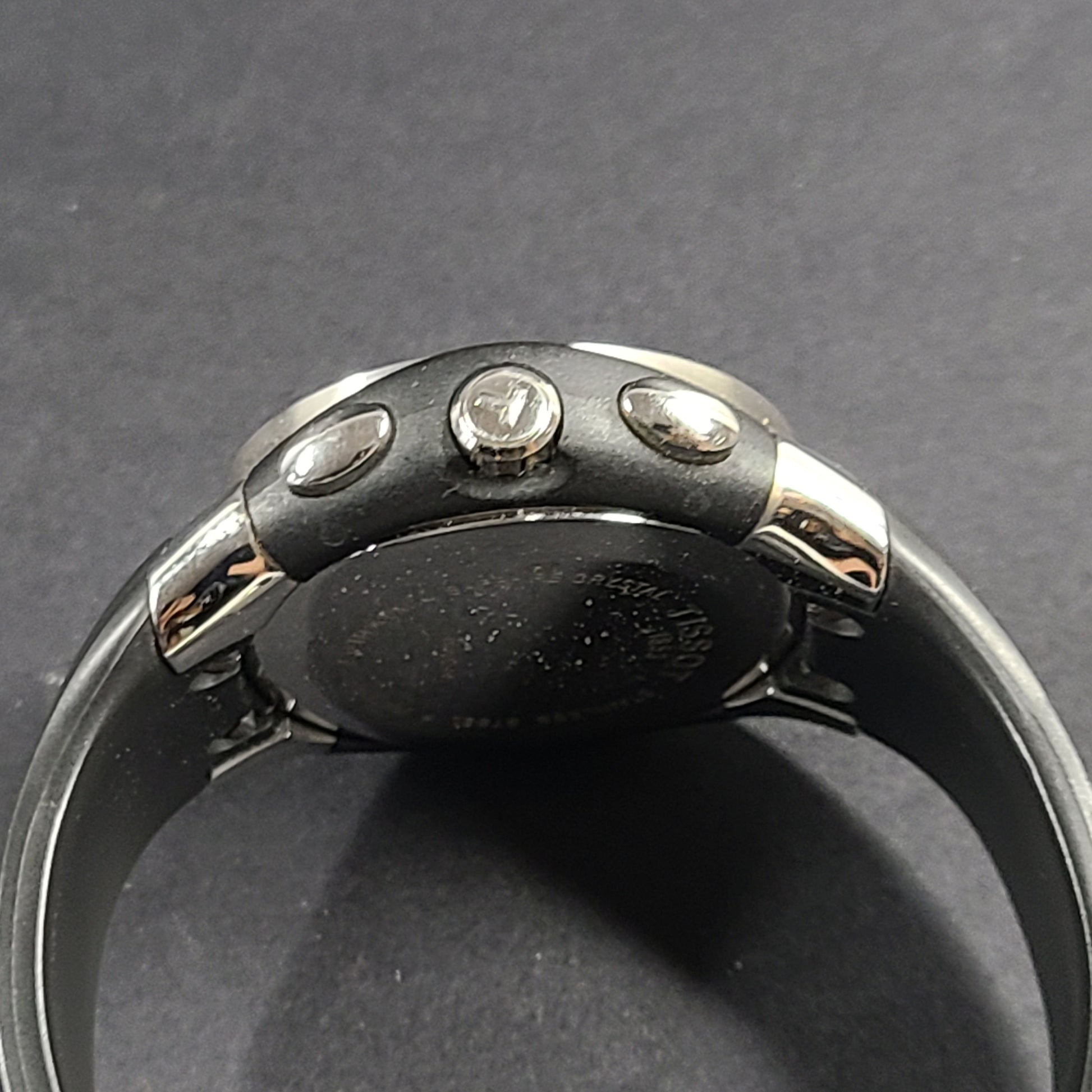 Tissot T Navigator 3000 stainless steel wristwatch with black dial and metal bracelet.