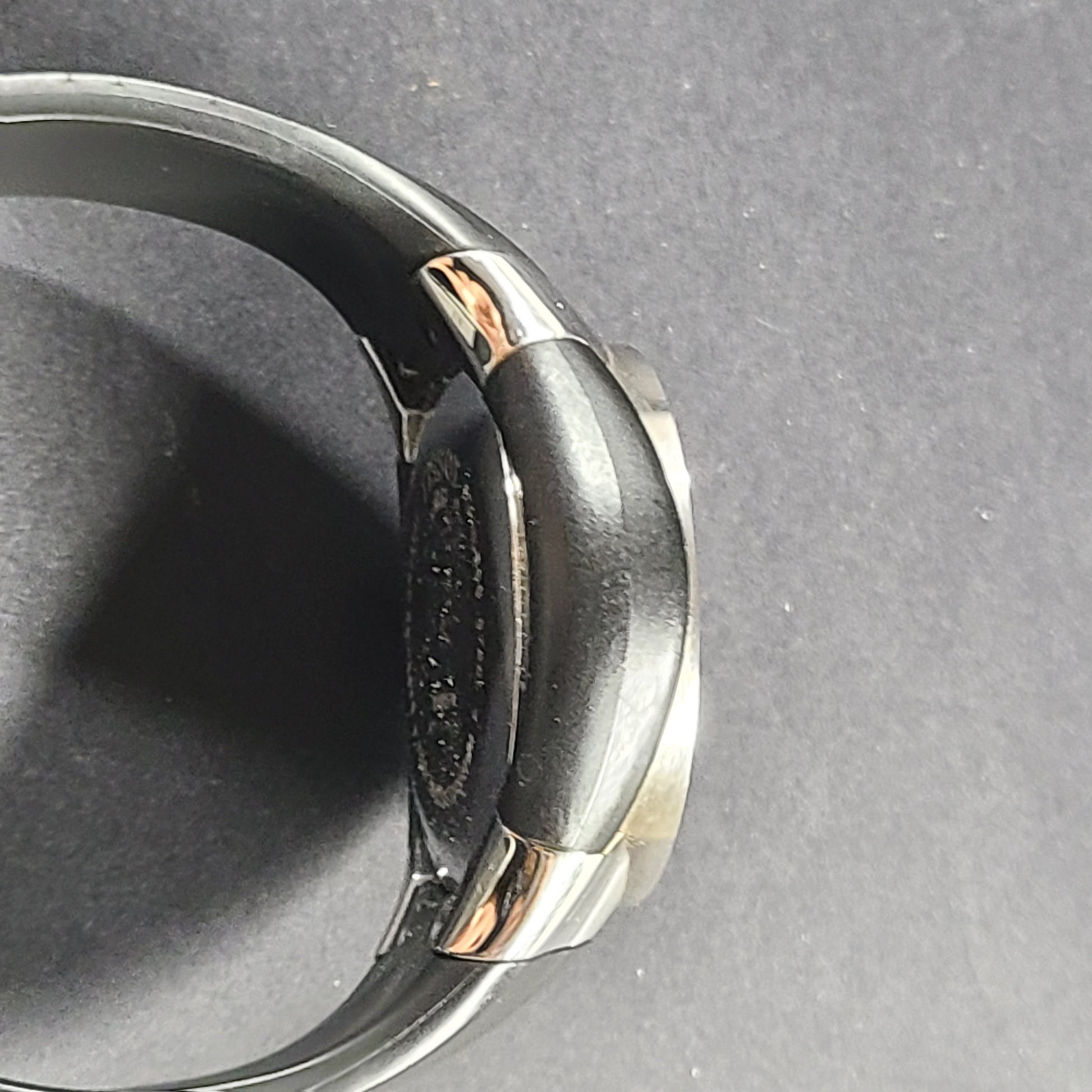 Tissot T Navigator 3000 stainless steel wristwatch with black dial and metal bracelet.