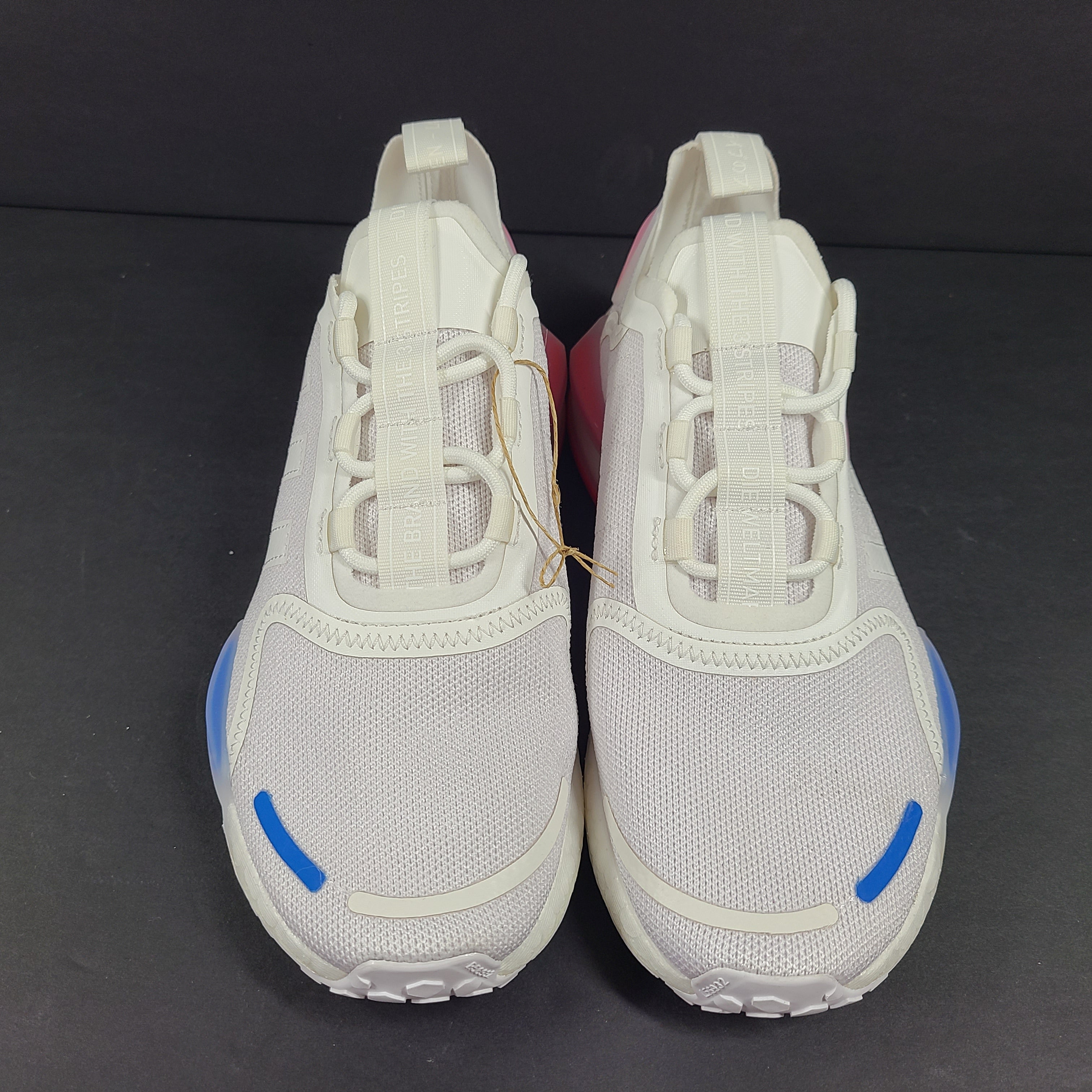 Adidas Parley multicolor low-top sneakers in US size 5.5 with white, red, and blue accents.