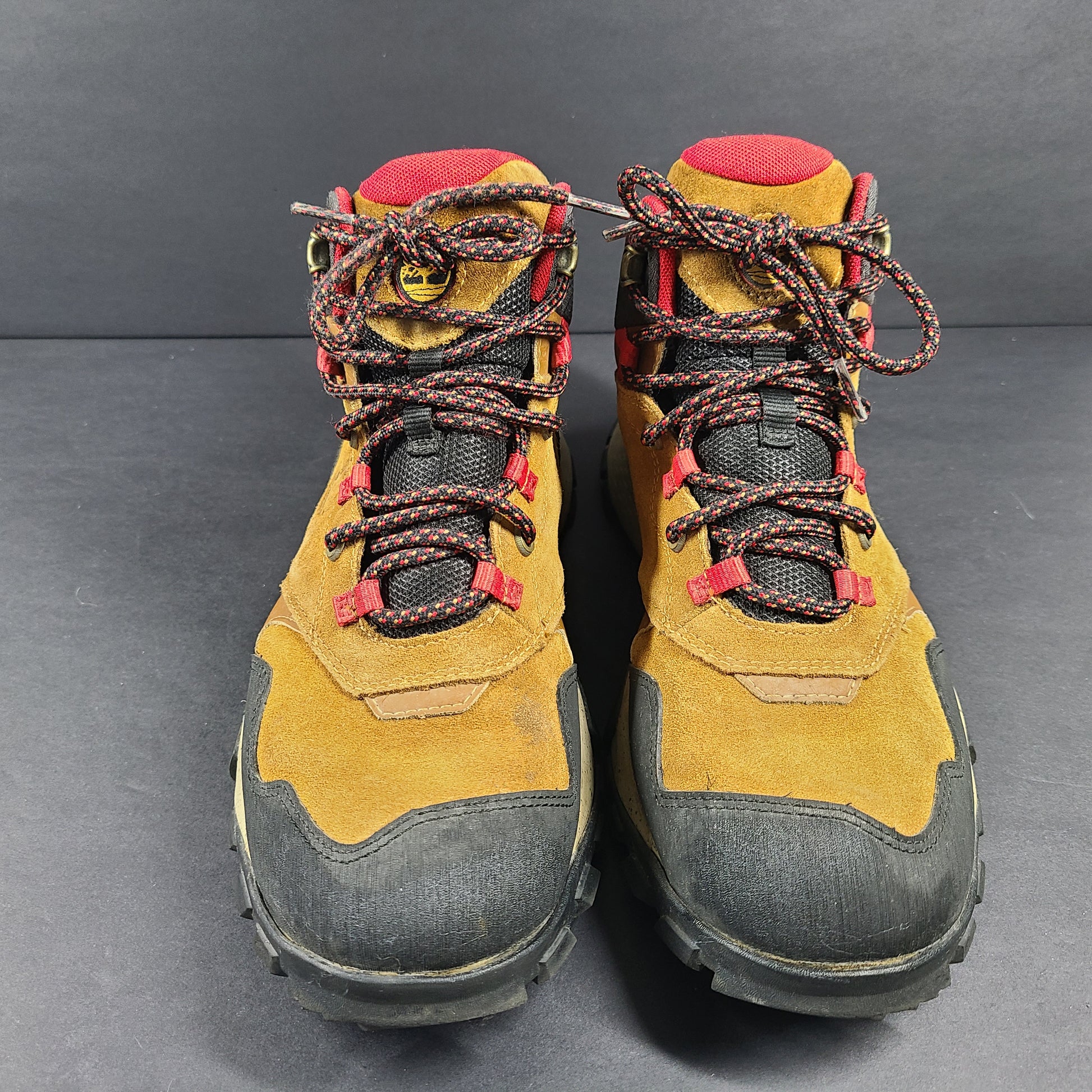 Timberland A23DV men's trail boots in brown and red with Timbergrip soles and US 9 sizing.