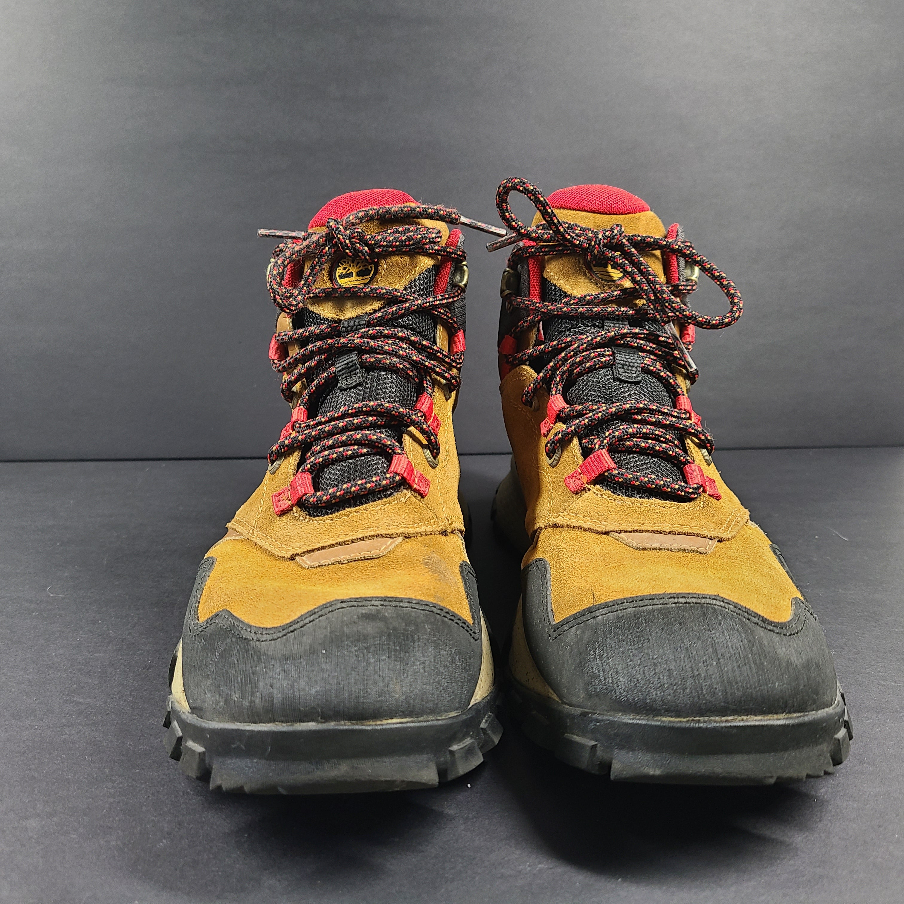 Timberland A23DV men's trail boots in brown and red with Timbergrip soles and US 9 sizing.