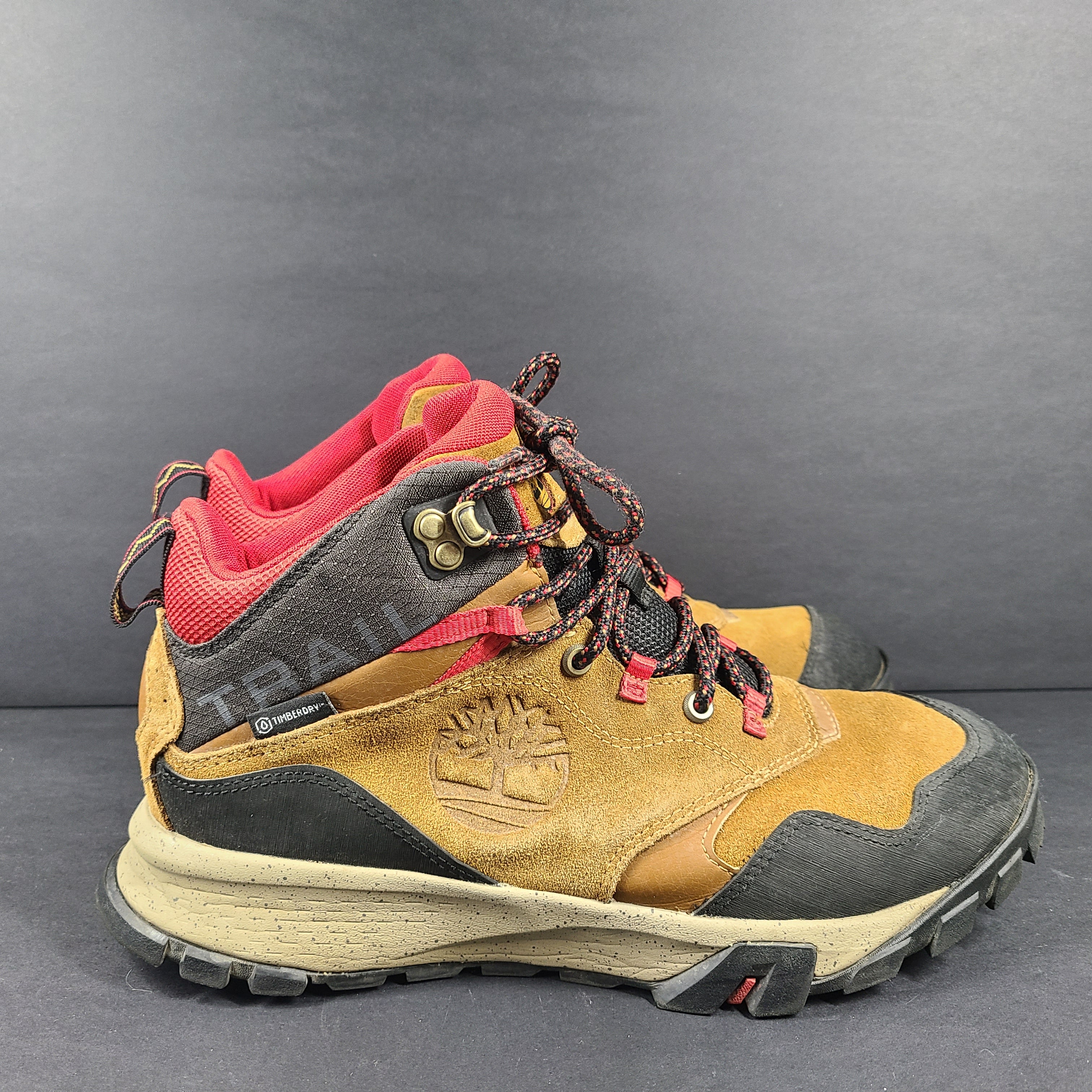 Timberland A23DV men's trail boots in brown and red with Timbergrip soles and US 9 sizing.