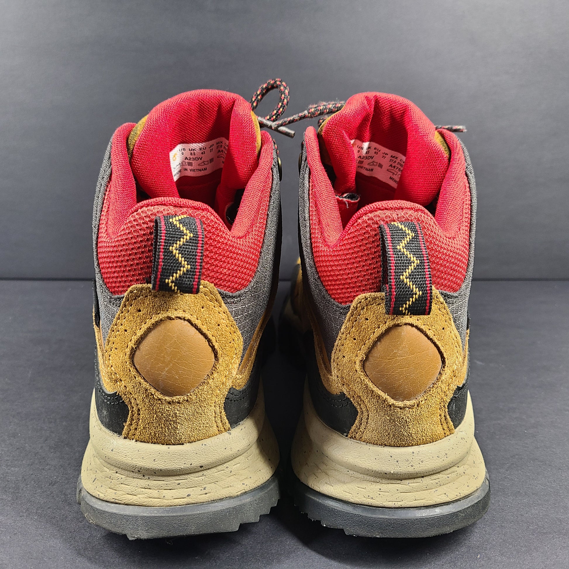 Timberland A23DV men's trail boots in brown and red with Timbergrip soles and US 9 sizing.
