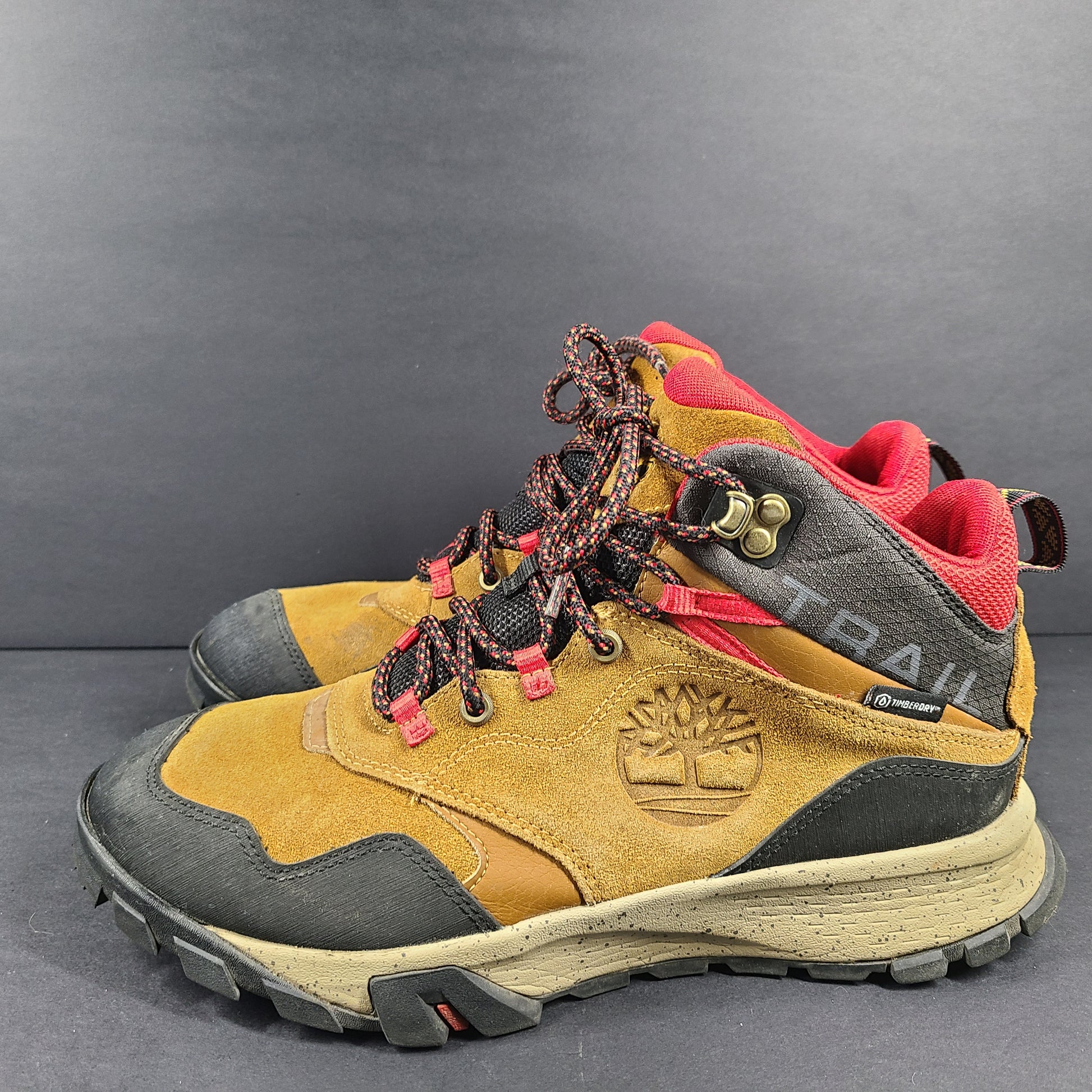 Timberland A23DV men's trail boots in brown and red with Timbergrip soles and US 9 sizing.