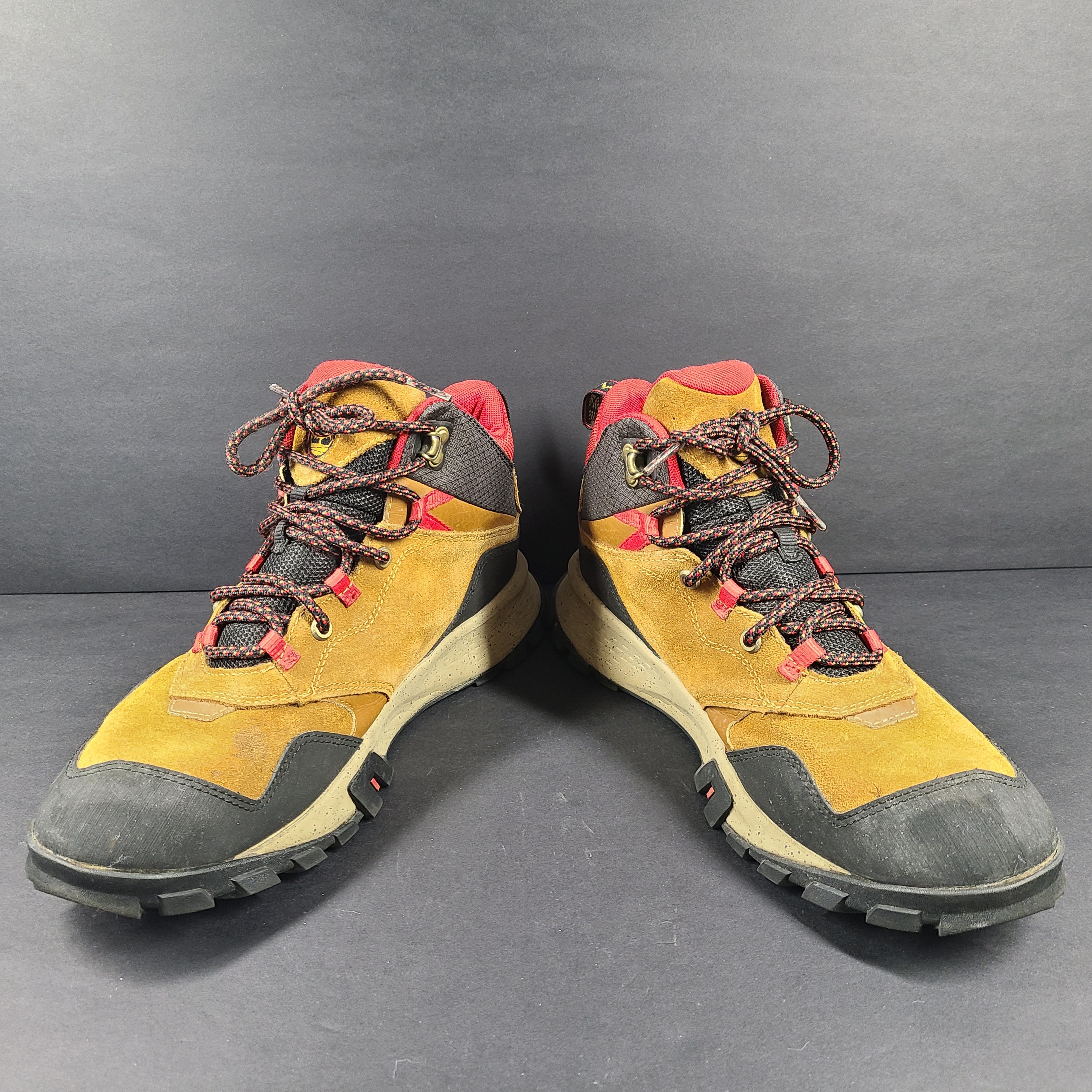Timberland A23DV men's trail boots in brown and red with Timbergrip soles and US 9 sizing.