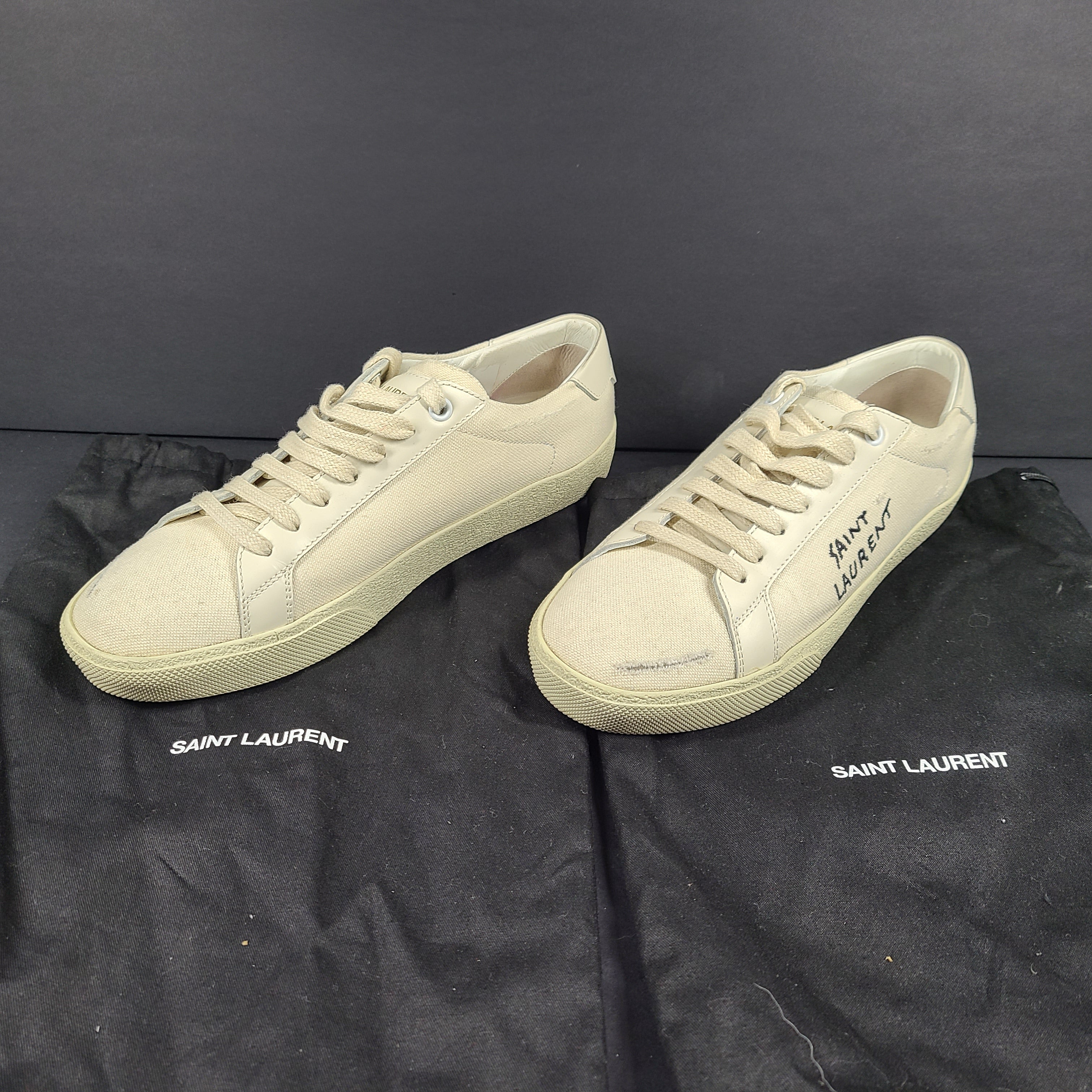 Beige Saint Laurent Court Classic SL/06 low-top sneakers with branded tongue and side text, EU 38½.