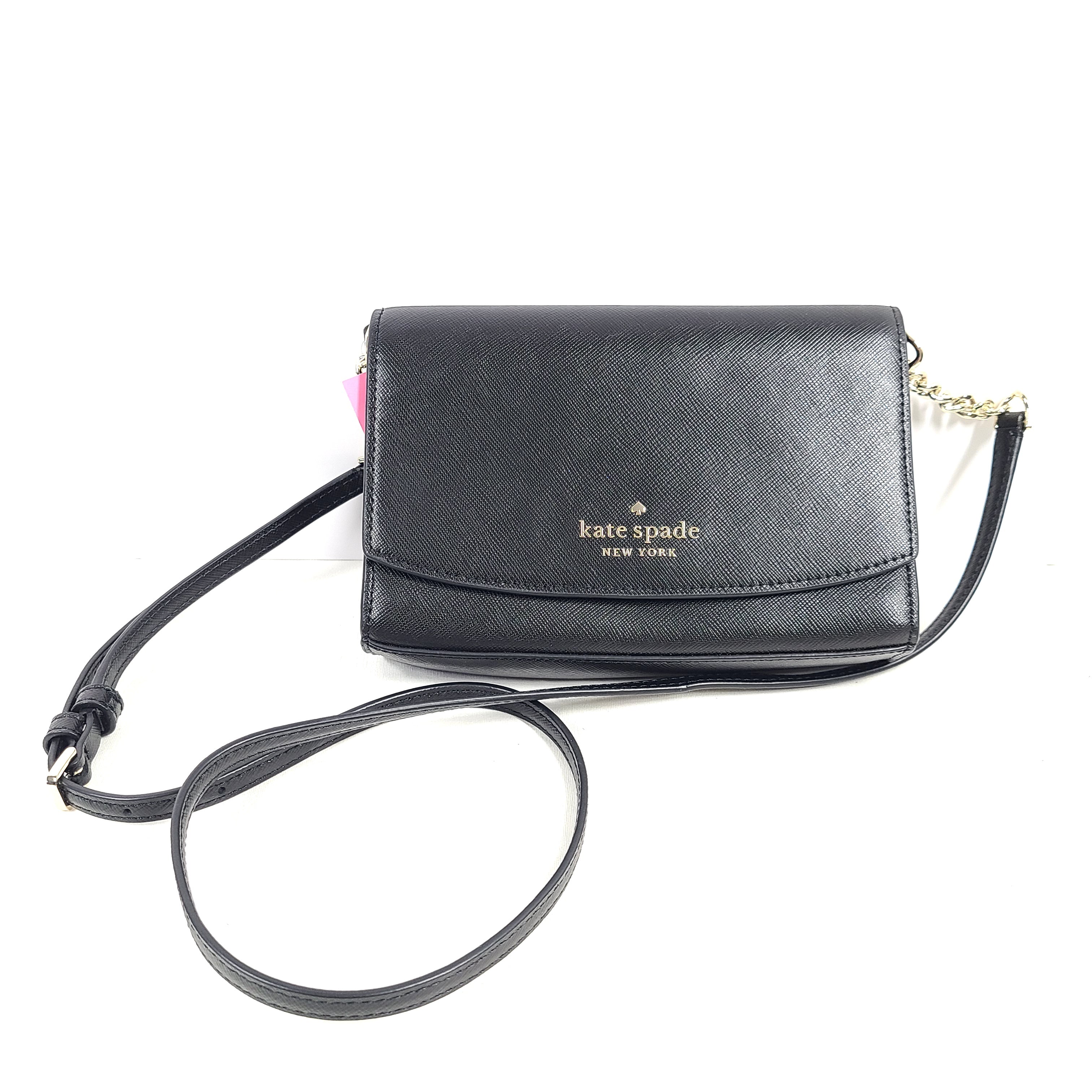 Kate Spade Staci small flip crossbody in black saffiano leather with a sleek silhouette and adjustable strap.
