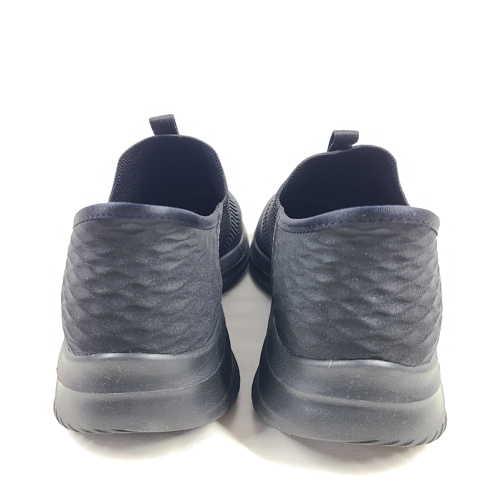 Black Skechers Slip-Ins Ultra Flex 3.0 men's slip-on shoes featuring knit upper and cushioned Air-Cooled Memory Foam for comfortable daily wear.