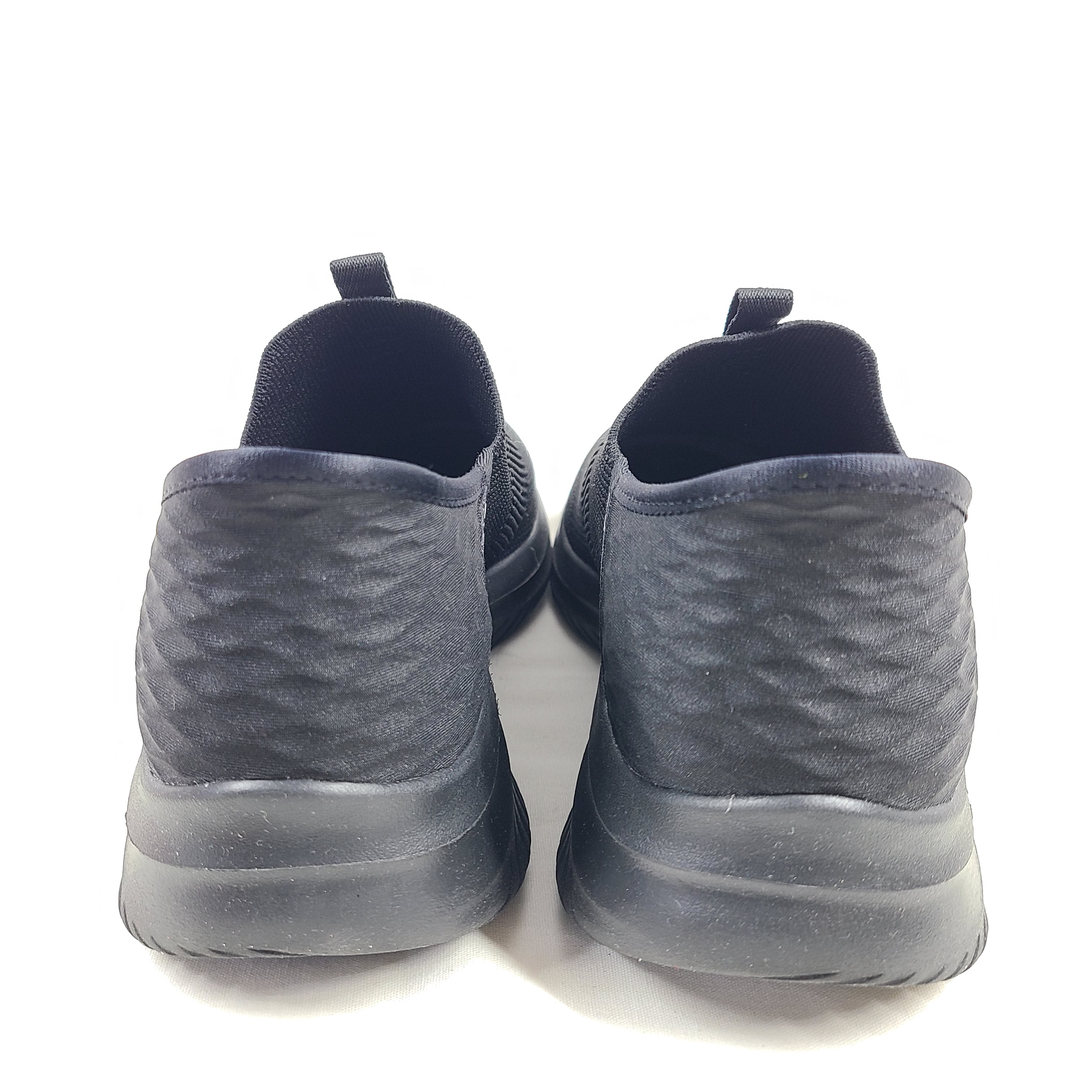 Black Skechers Slip-Ins Ultra Flex 3.0 men's slip-on shoes featuring knit upper and cushioned Air-Cooled Memory Foam for comfortable daily wear.