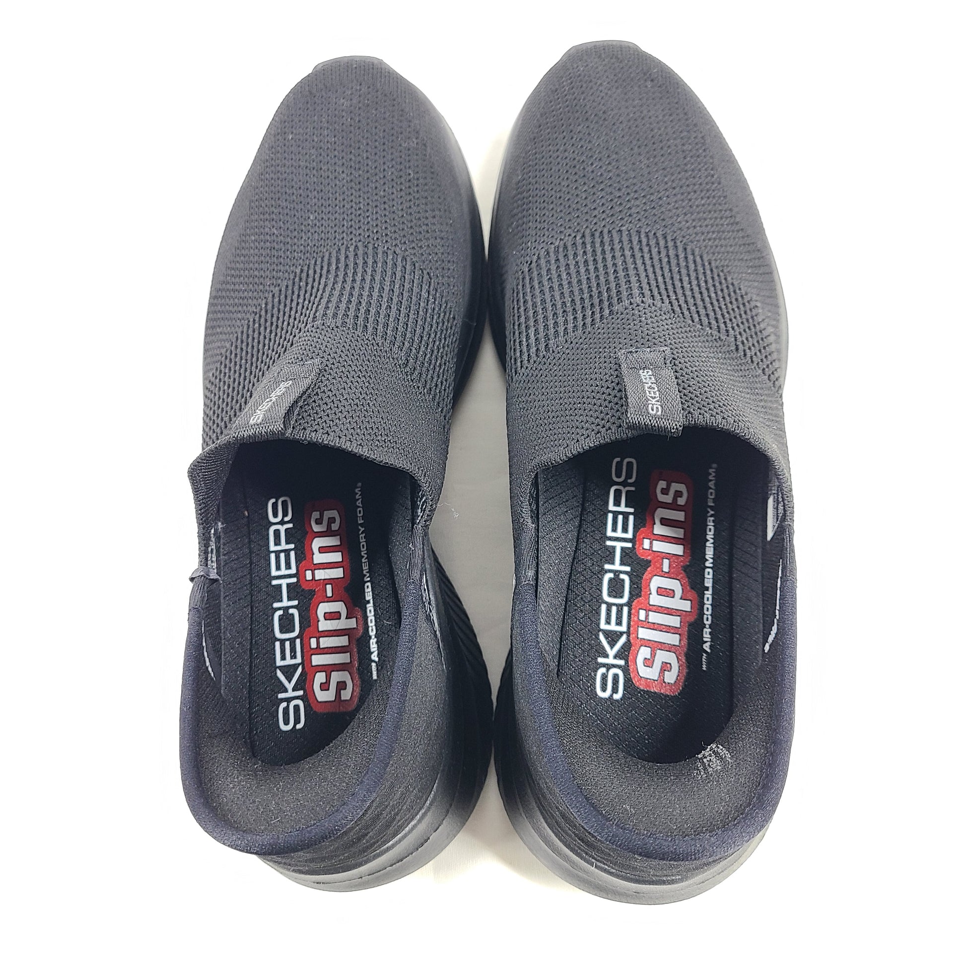 Black Skechers Slip-Ins Ultra Flex 3.0 men's slip-on shoes featuring knit upper and cushioned Air-Cooled Memory Foam for comfortable daily wear.