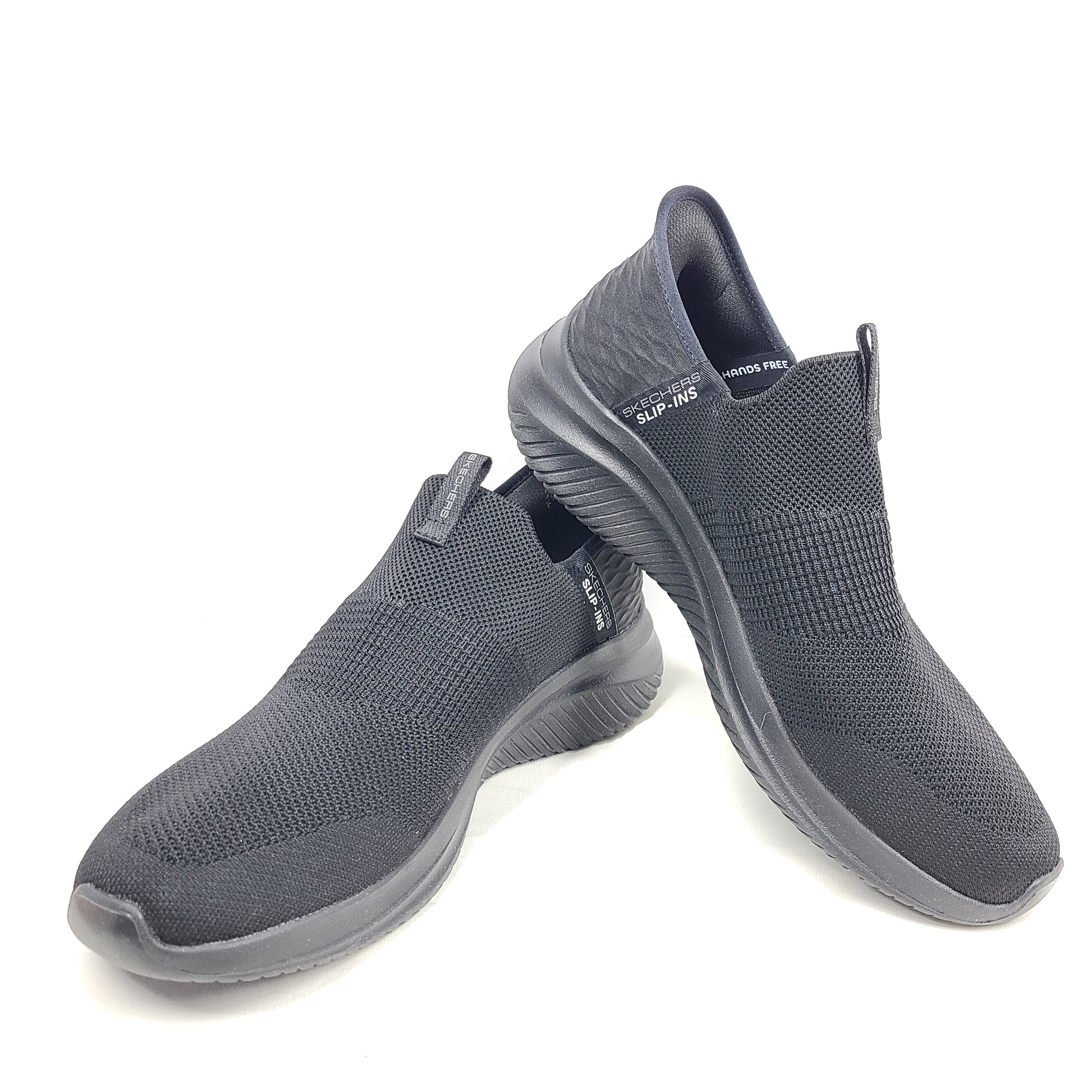 Black Skechers Slip-Ins Ultra Flex 3.0 men's slip-on shoes featuring knit upper and cushioned Air-Cooled Memory Foam for comfortable daily wear.