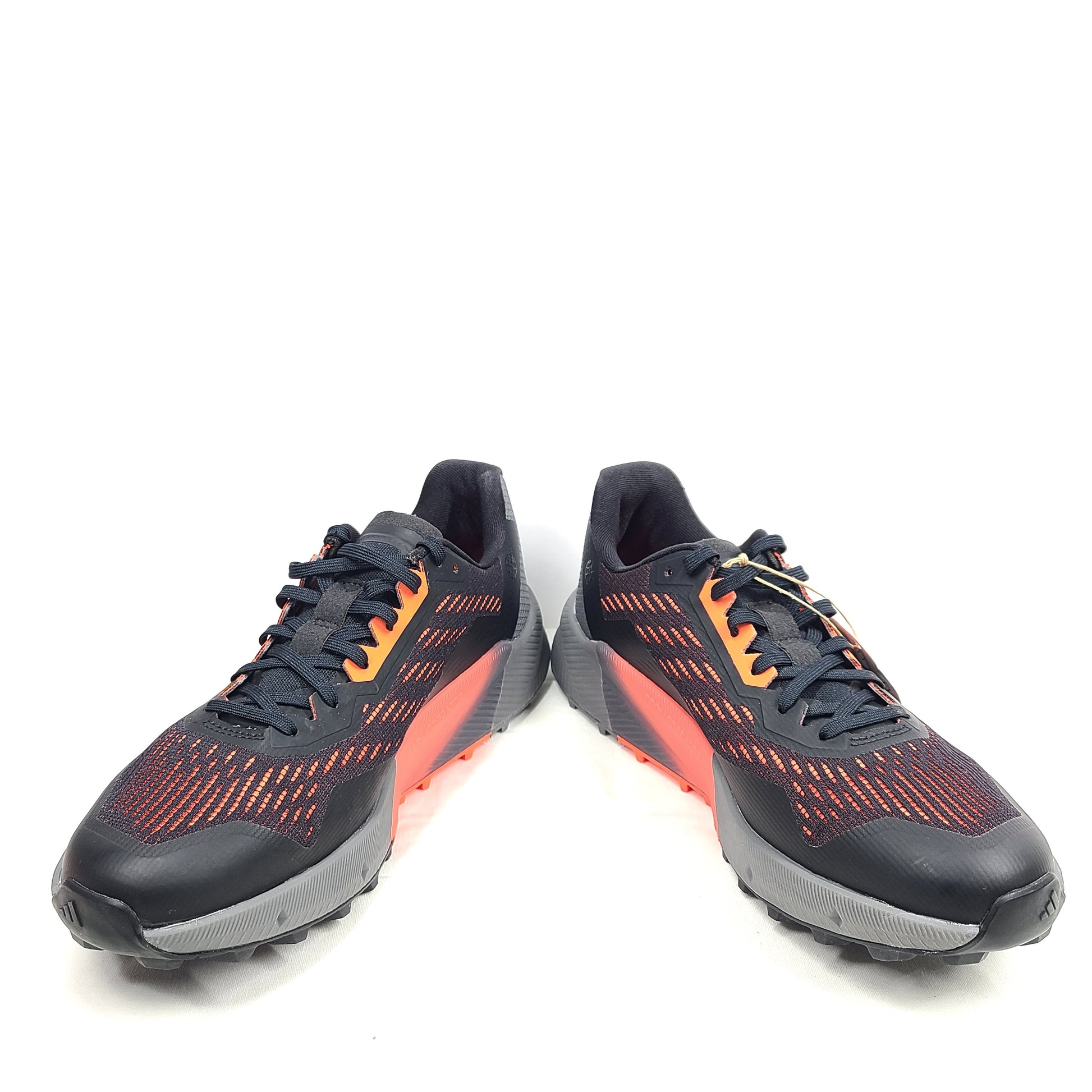 Black, orange, and gray Adidas Terrex Agravic Flow trail running shoe in US size 8 with responsive cushioning and a grippy outsole.