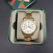 Gold-tone Michael Kors MK6692 women's analog stainless steel watch with white dial and linked bracelet.