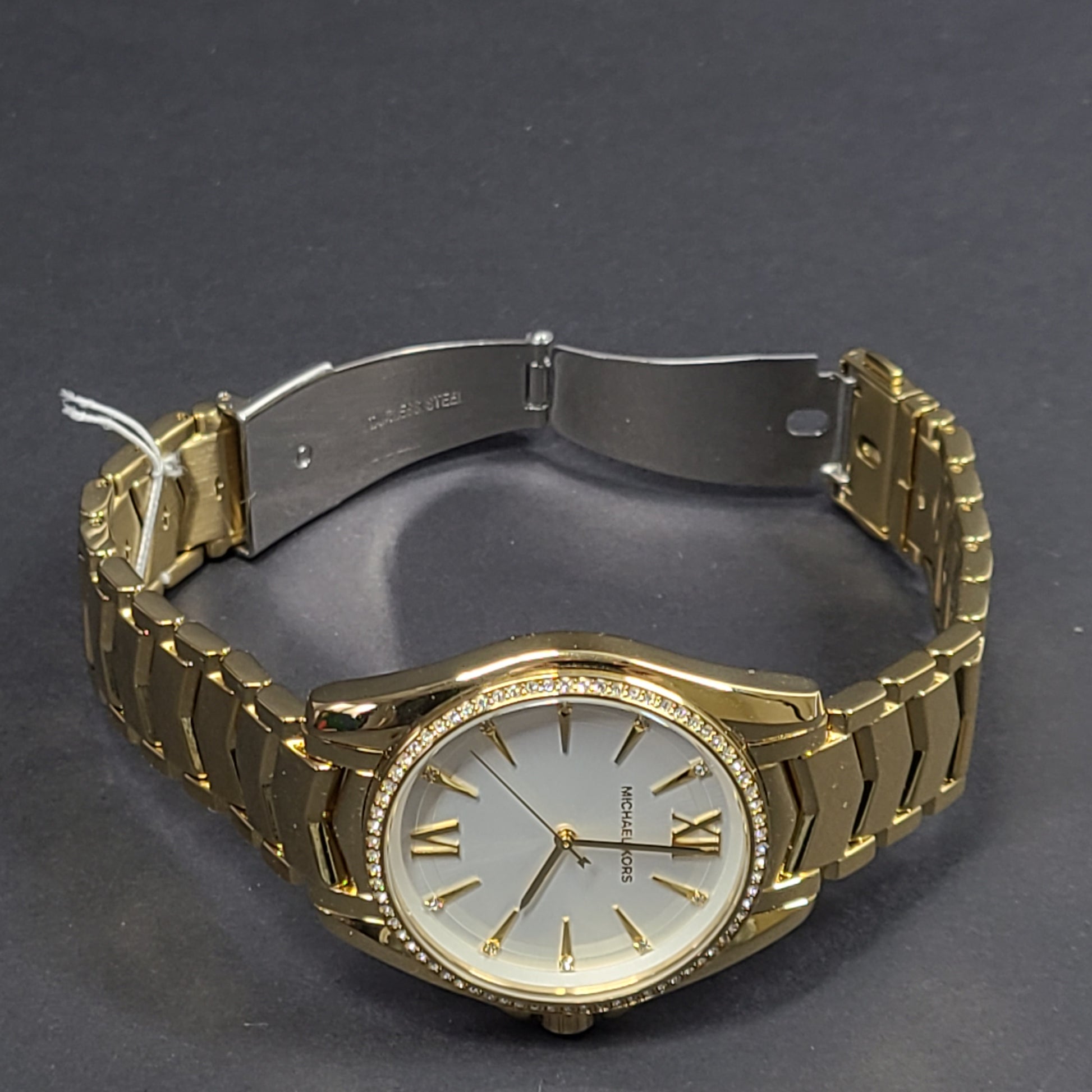 Gold-tone Michael Kors MK6692 women's analog stainless steel watch with white dial and linked bracelet.