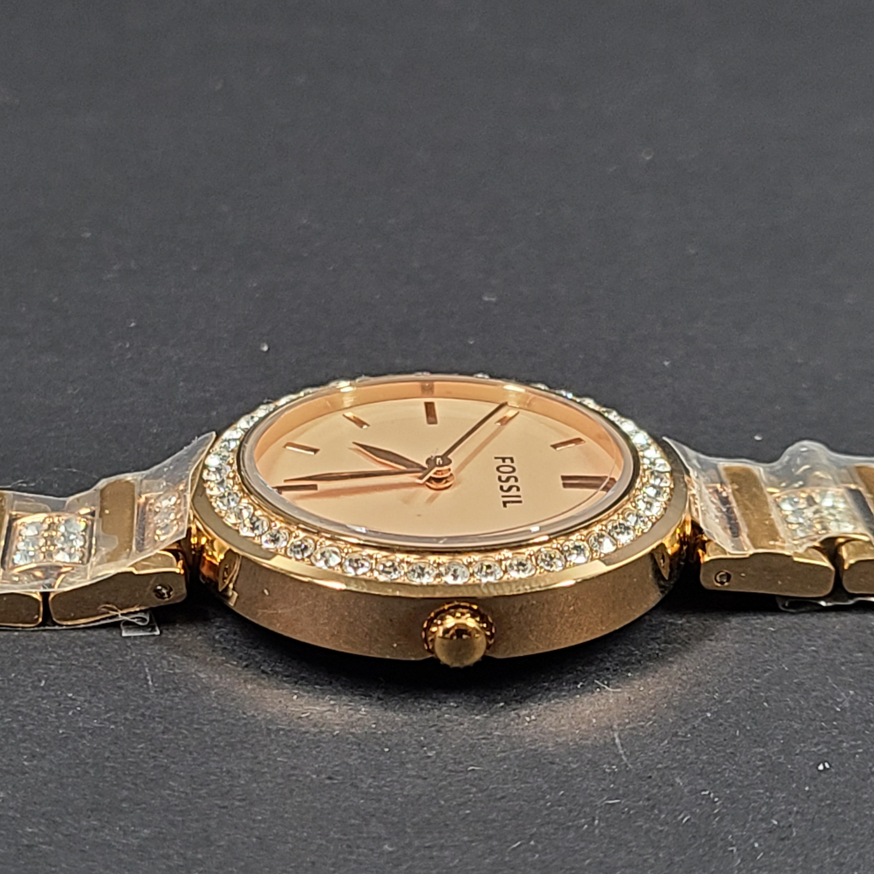 Rose gold Fossil Karli three-hand stainless steel watch with a minimalist round dial and bracelet band.