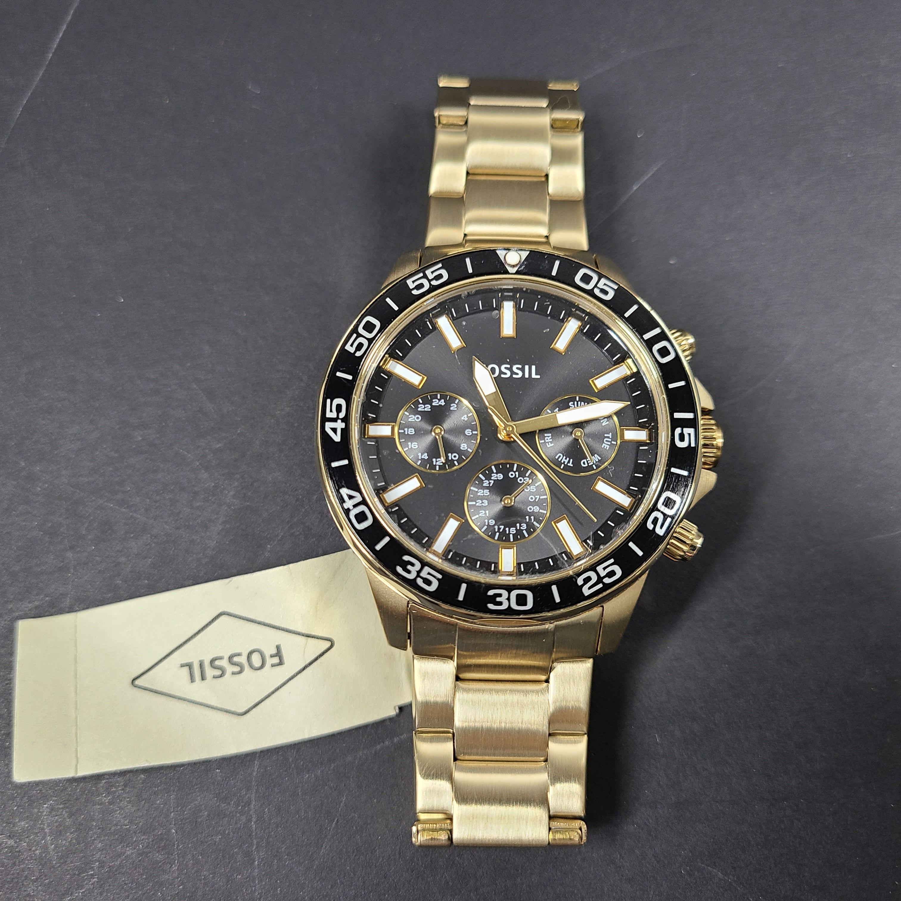 Gold stainless steel Fossil BQ2643MSET wristwatch with bracelet and Japan movement.